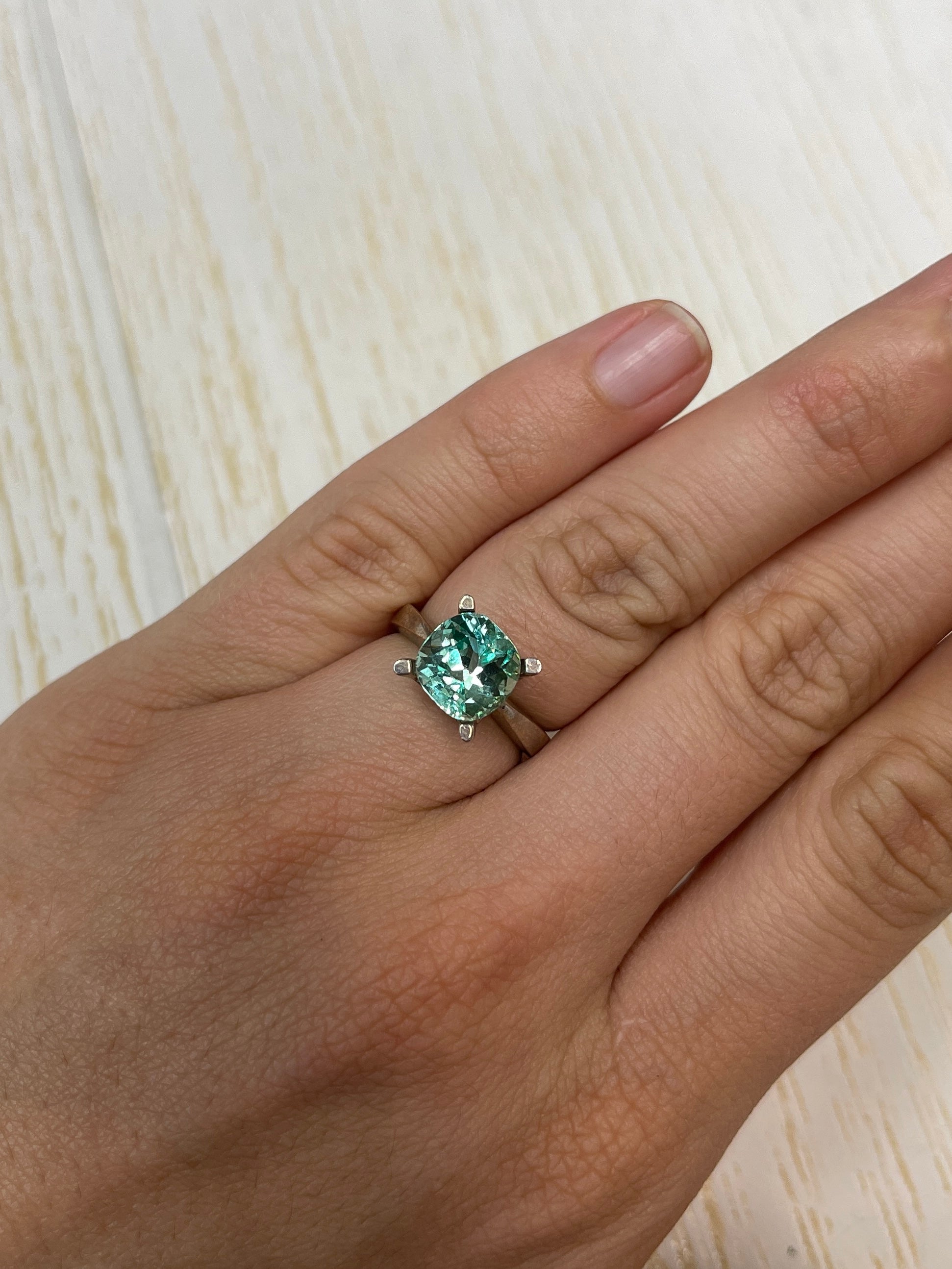 3.31 carat natural Colombian emerald, 9x9mm cushion cut, pastel light green gemstone from JR Colombian Emeralds.
