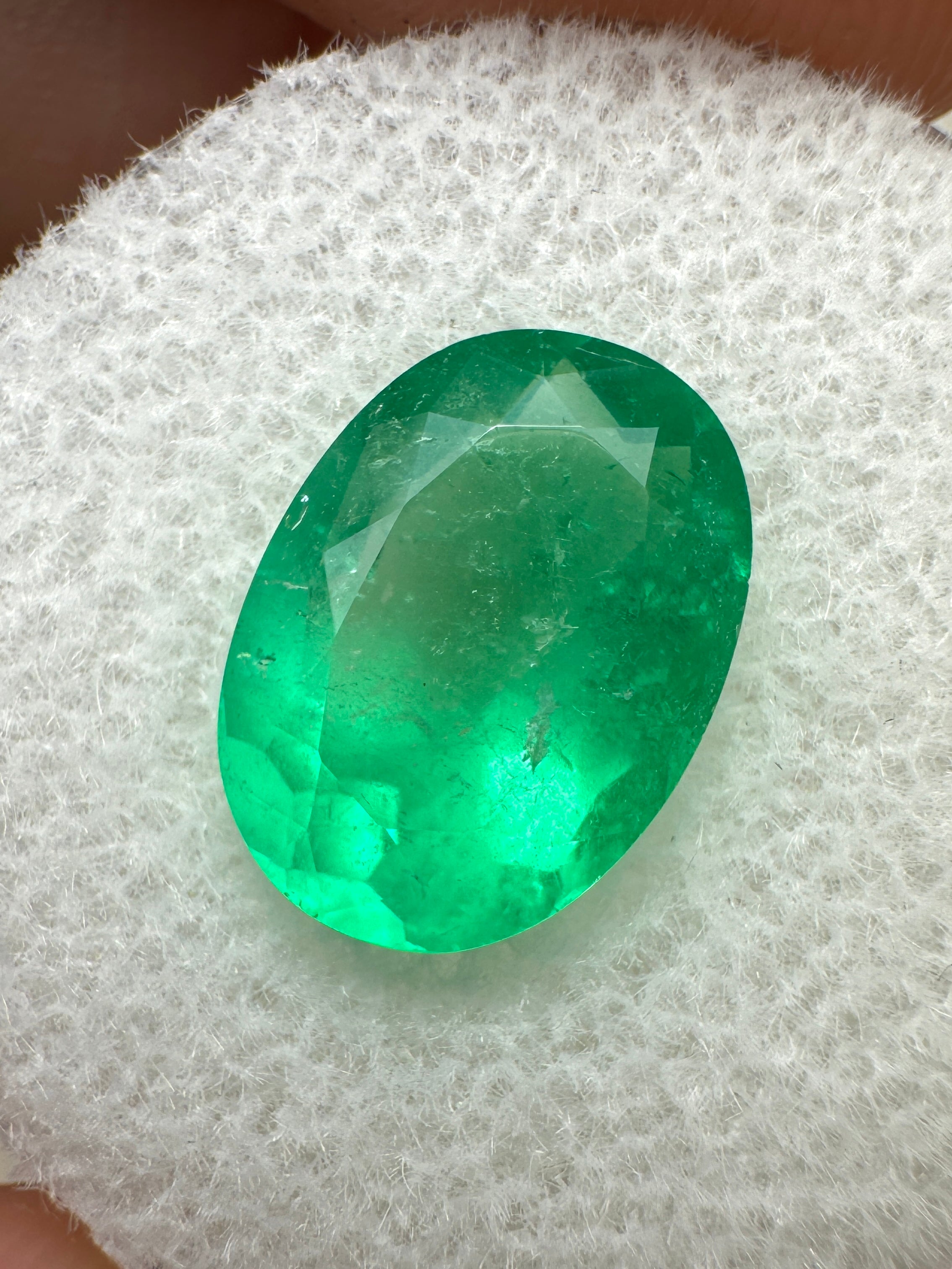 Natural neon green Colombian emerald, 3.32 carats, oval cut, loose gemstone from JR Colombian Emeralds.