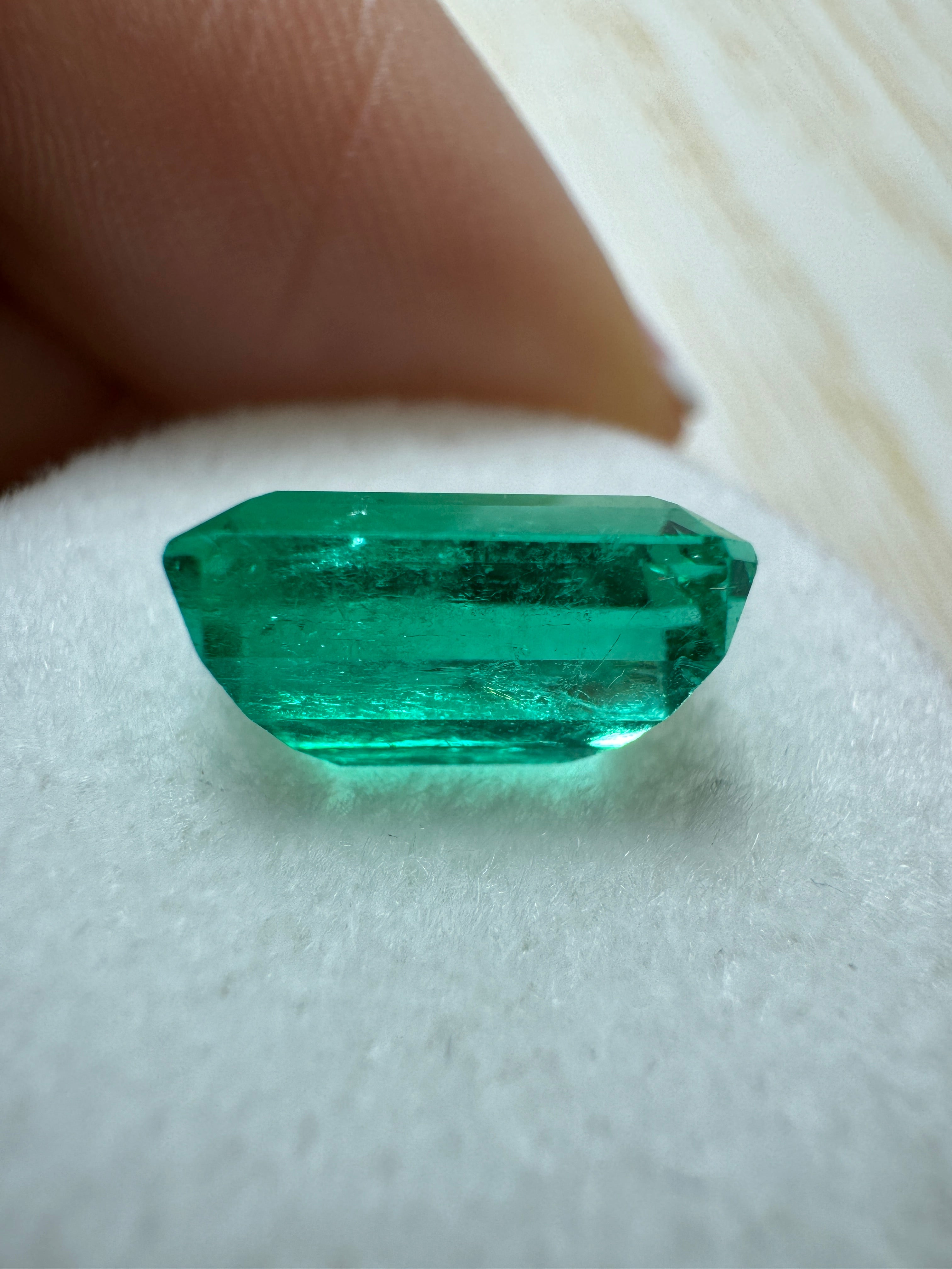 Vivid bluish-green 3.40 carat GIA certified Colombian emerald in elongated cut, natural loose gemstone from JR Colombian Emeralds.