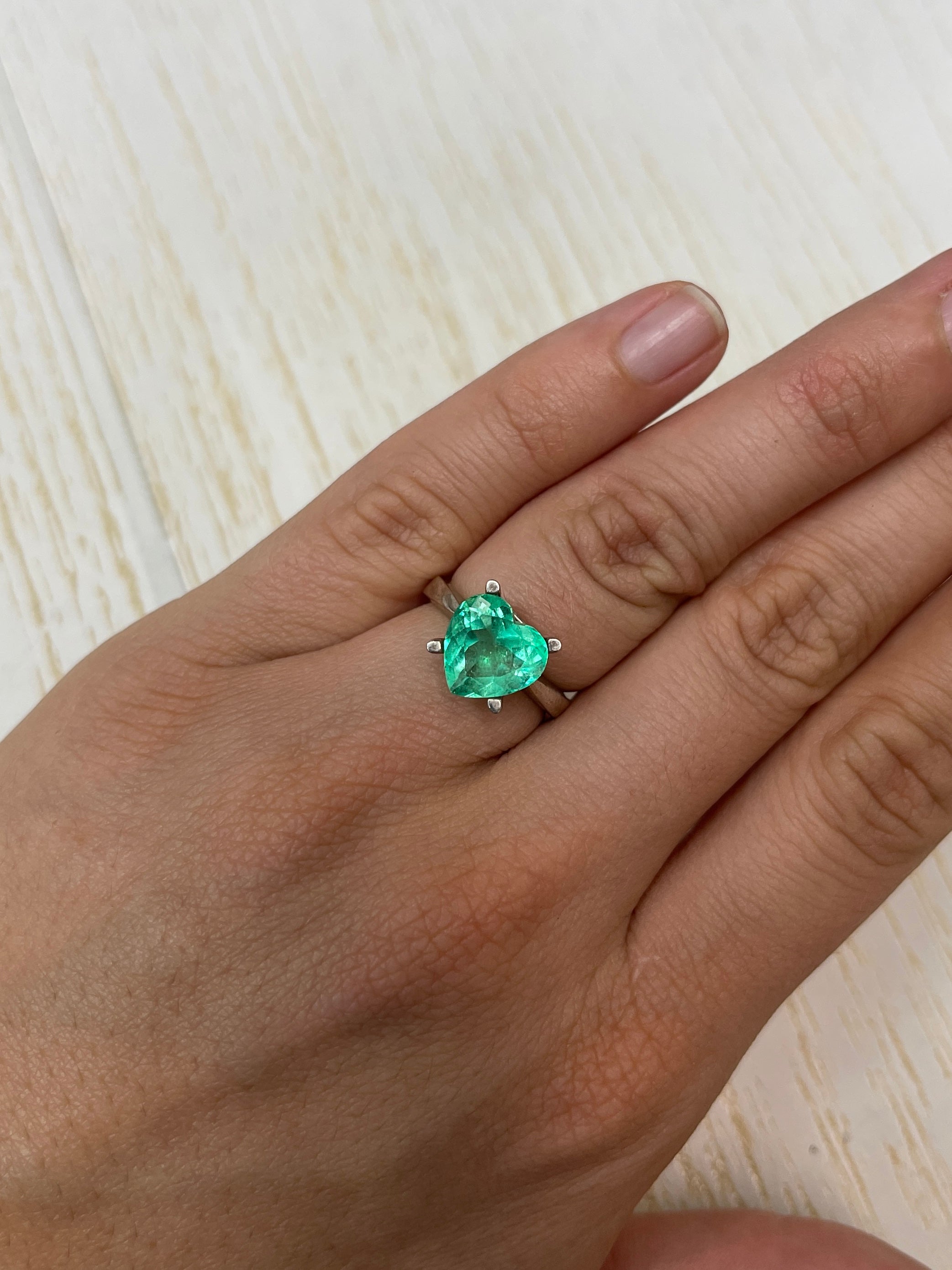 3.50 Carat bubbly green natural Colombian emerald loose gemstone with heart cut, showcasing vibrant color and clarity.