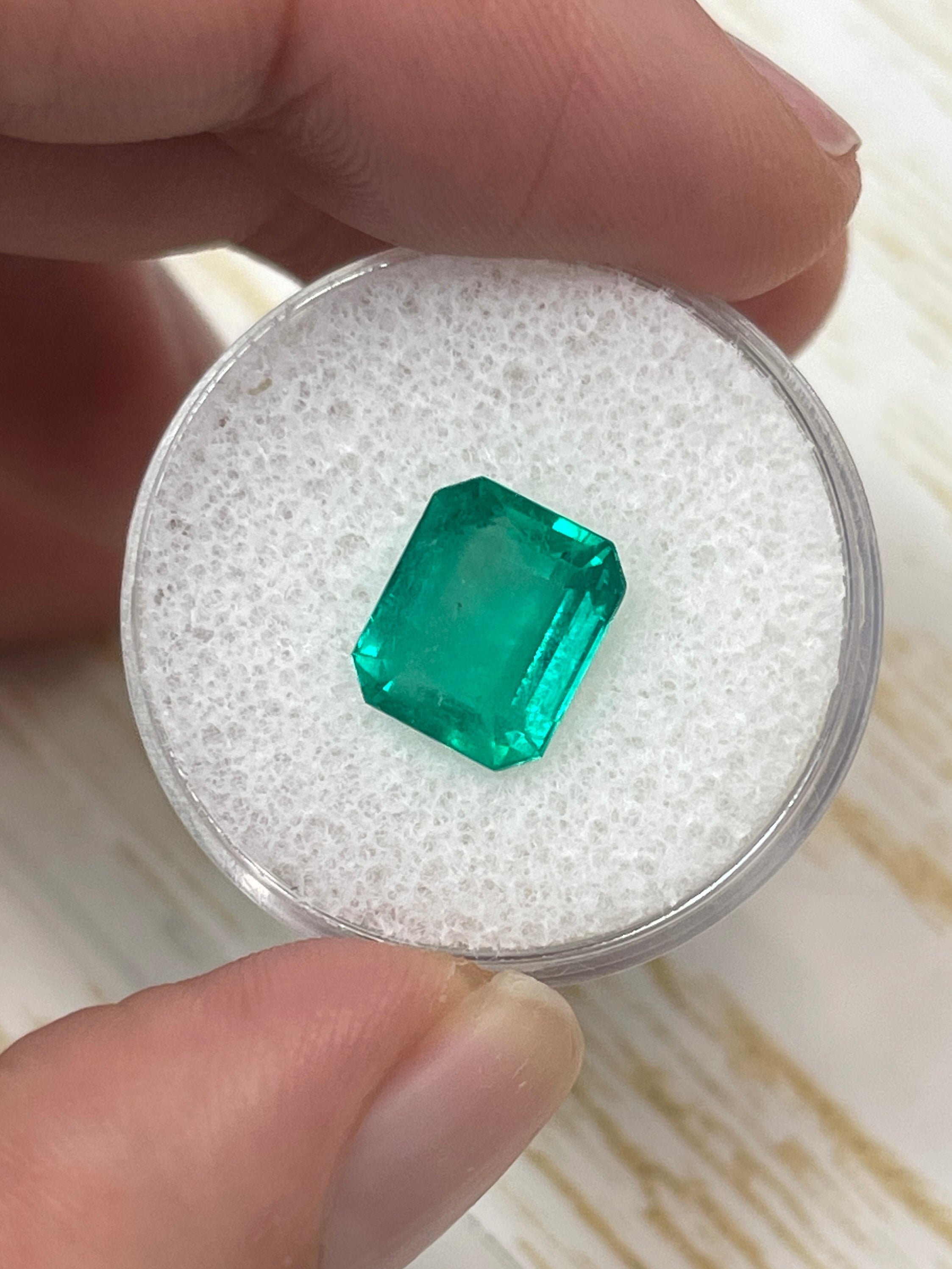 3.53 carat medium bluish green Colombian emerald loose gemstone in emerald cut, from JR Colombian Emeralds.