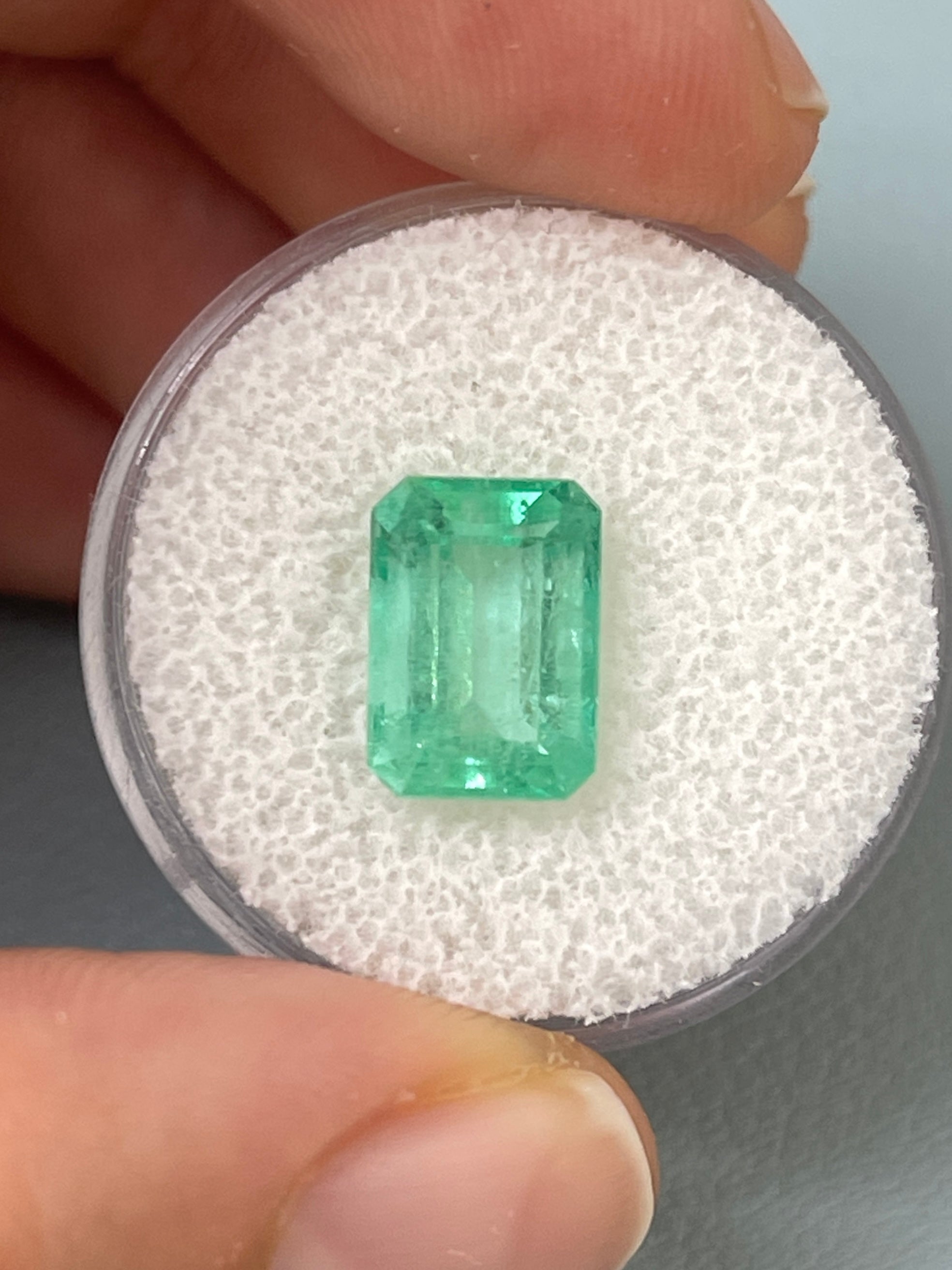 Seafoam green 3.54 carat natural Colombian emerald in an emerald cut, loose gemstone from JR Colombian Emeralds.