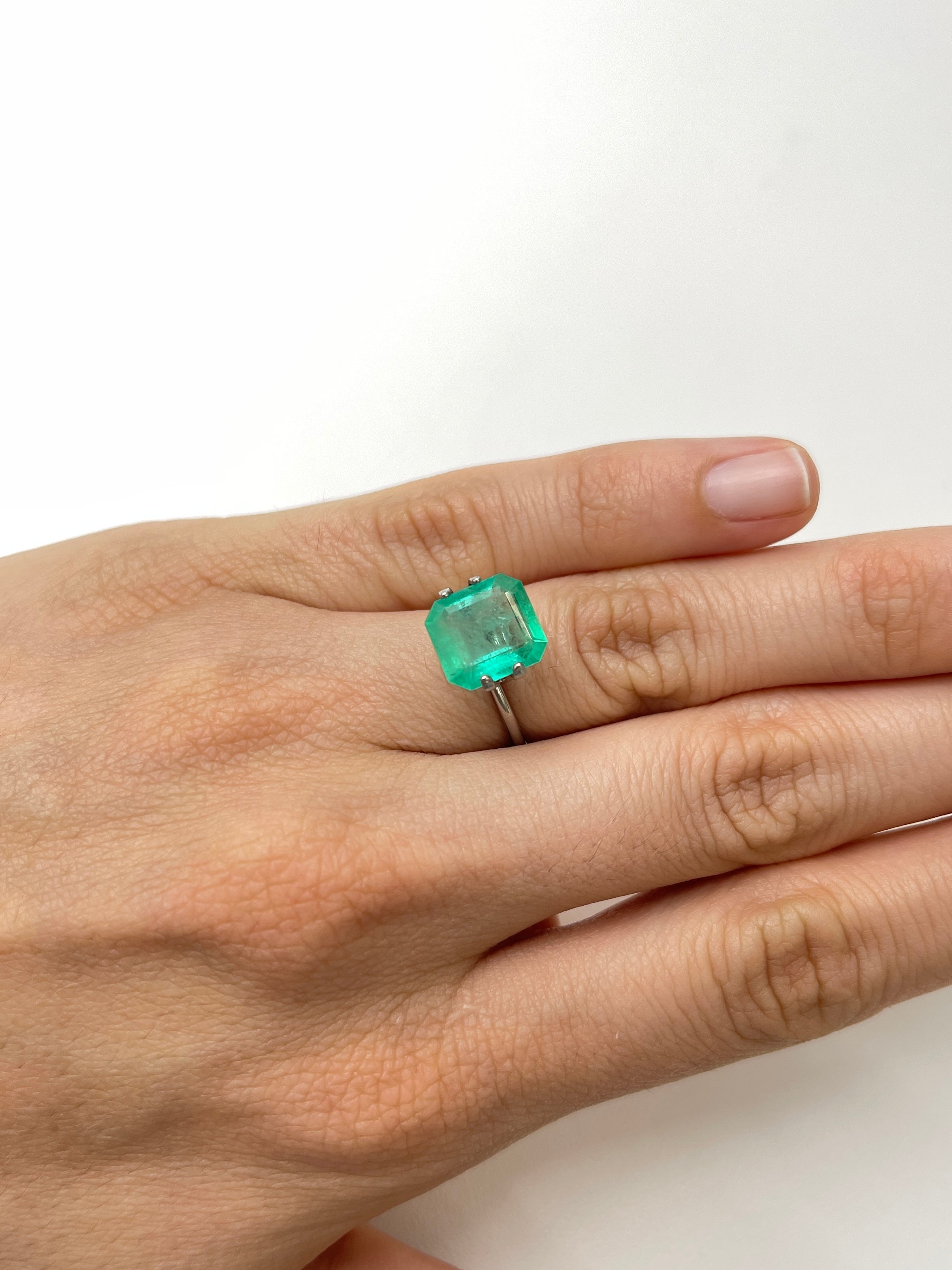 Spring green 3.59 carat Colombian emerald loose gemstone in Asscher cut, photographed by JR Colombian Emeralds.