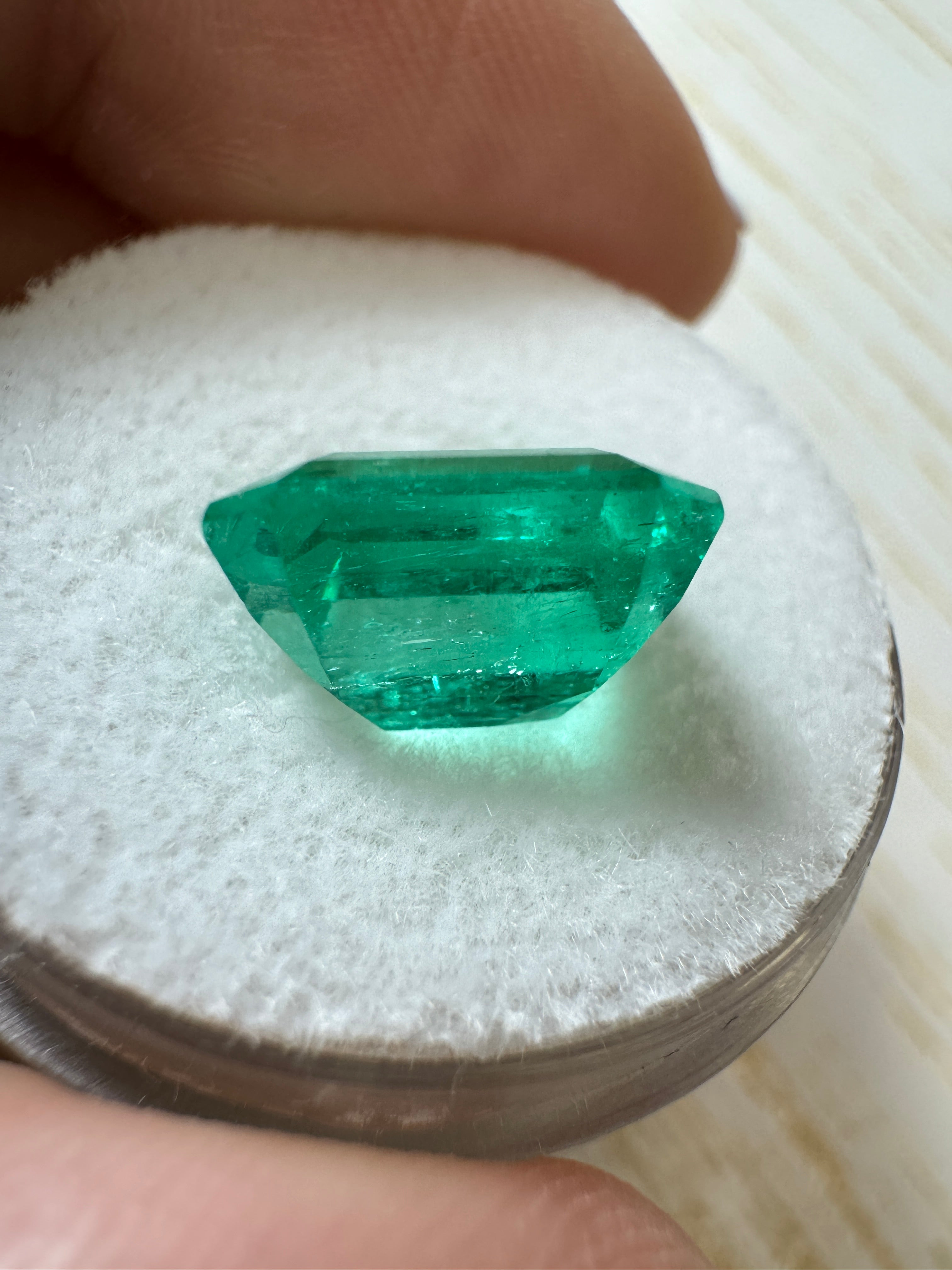 3.61 carat vivacious green natural Colombian emerald in 10x9mm emerald cut, loose gemstone from JR Colombian Emeralds.