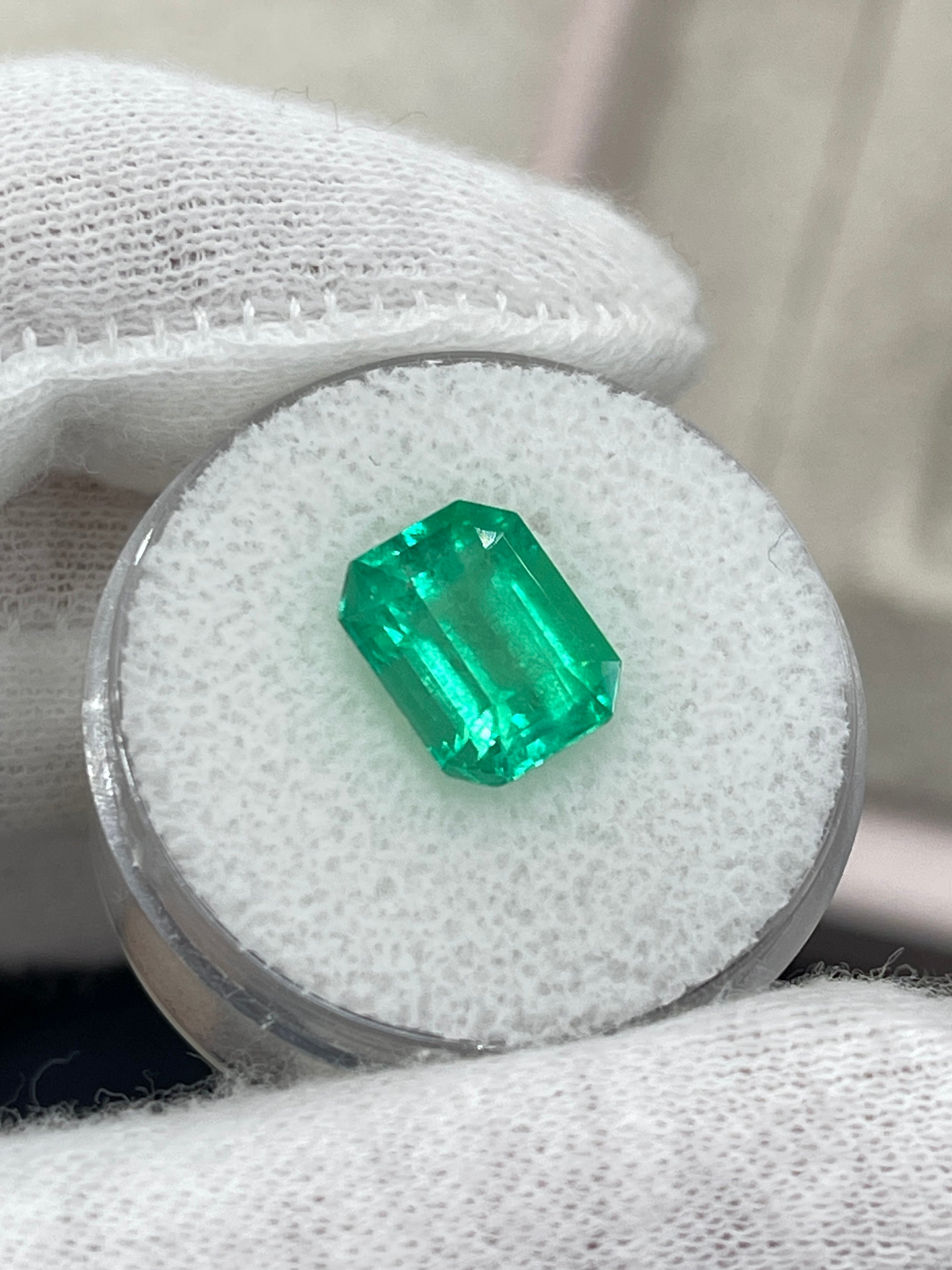 Natural 3.64 carat yellowish-green Colombian emerald loose stone in an emerald cut, from JR Colombian Emeralds.