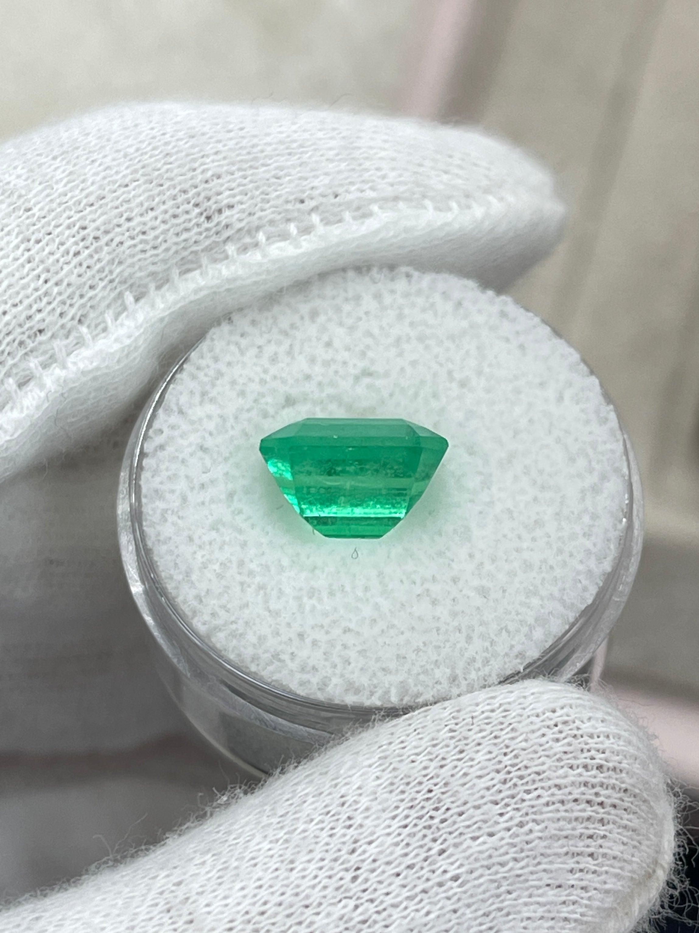 Loose 3.64 carat yellowish green Colombian emerald in an emerald cut, natural and unmounted, from JR Colombian Emeralds.