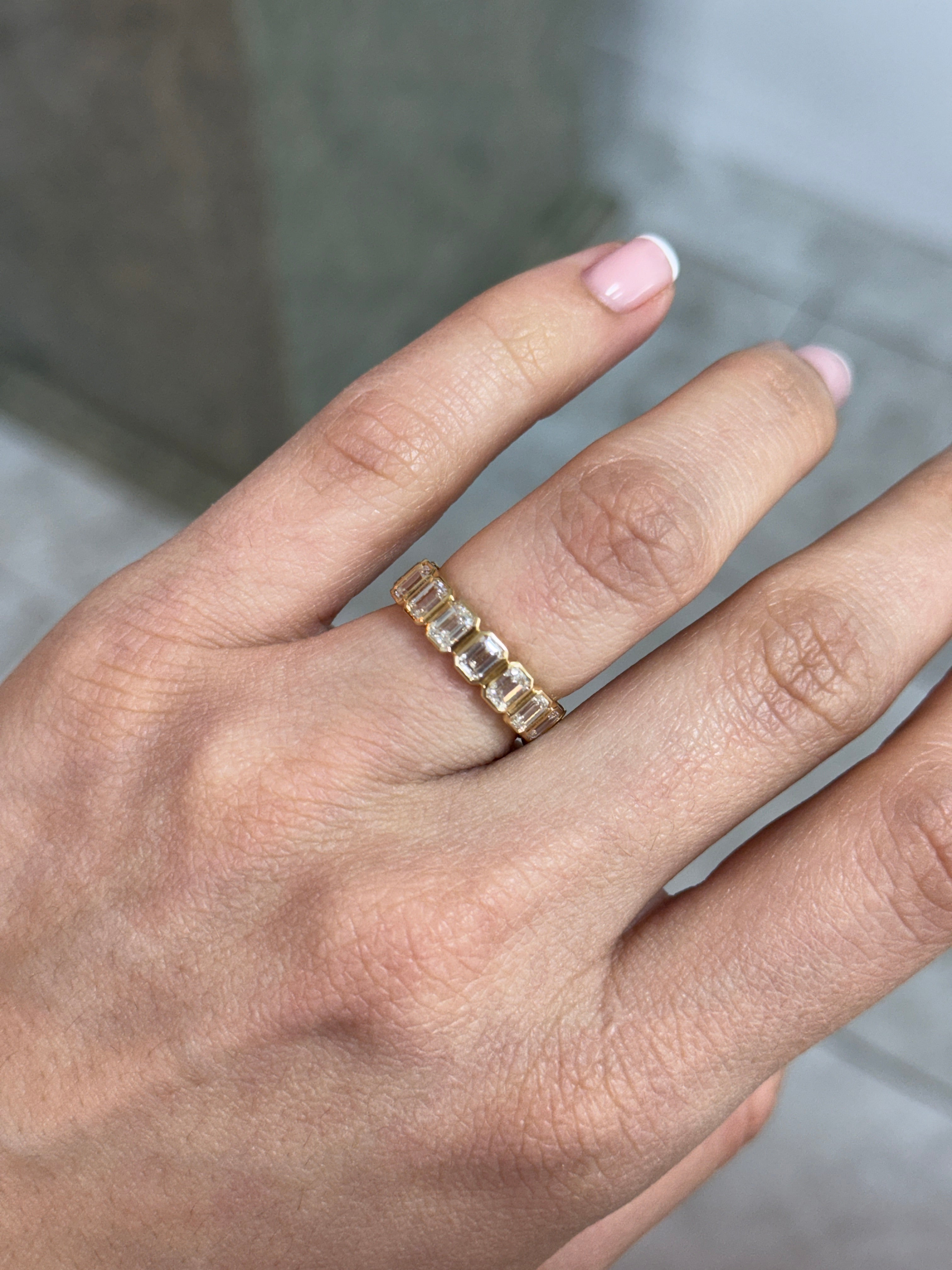 JR Colombian Emeralds 18K gold eternity band with 3.65tcw undecided half oval and emerald cut diamonds, size 6.5.