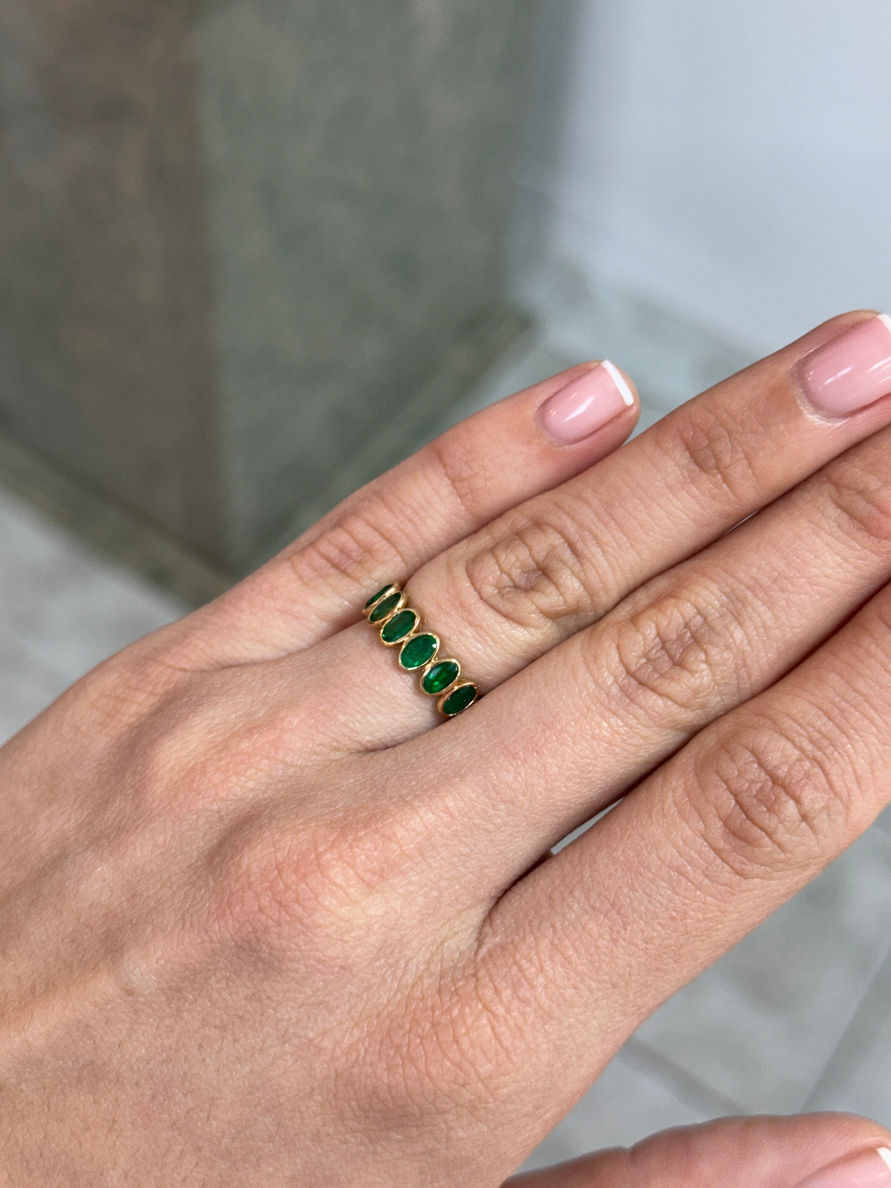 JR Colombian Emeralds 18K gold eternity band featuring 3.65tcw undecided half oval and emerald cut diamonds, size 6.5