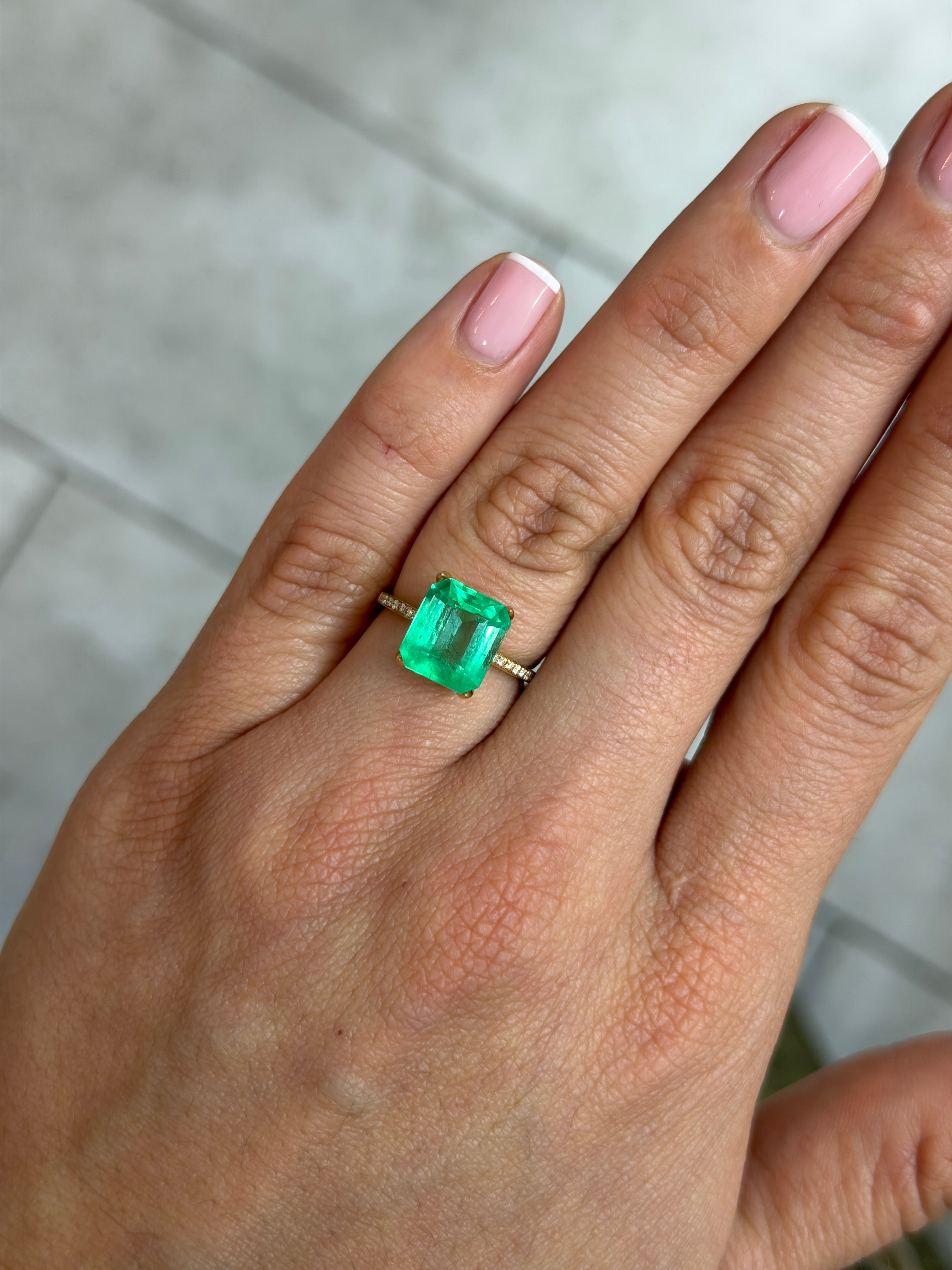 Natural 3.72 carat spring green Colombian emerald loose gemstone in an emerald cut, from JR Colombian Emeralds.