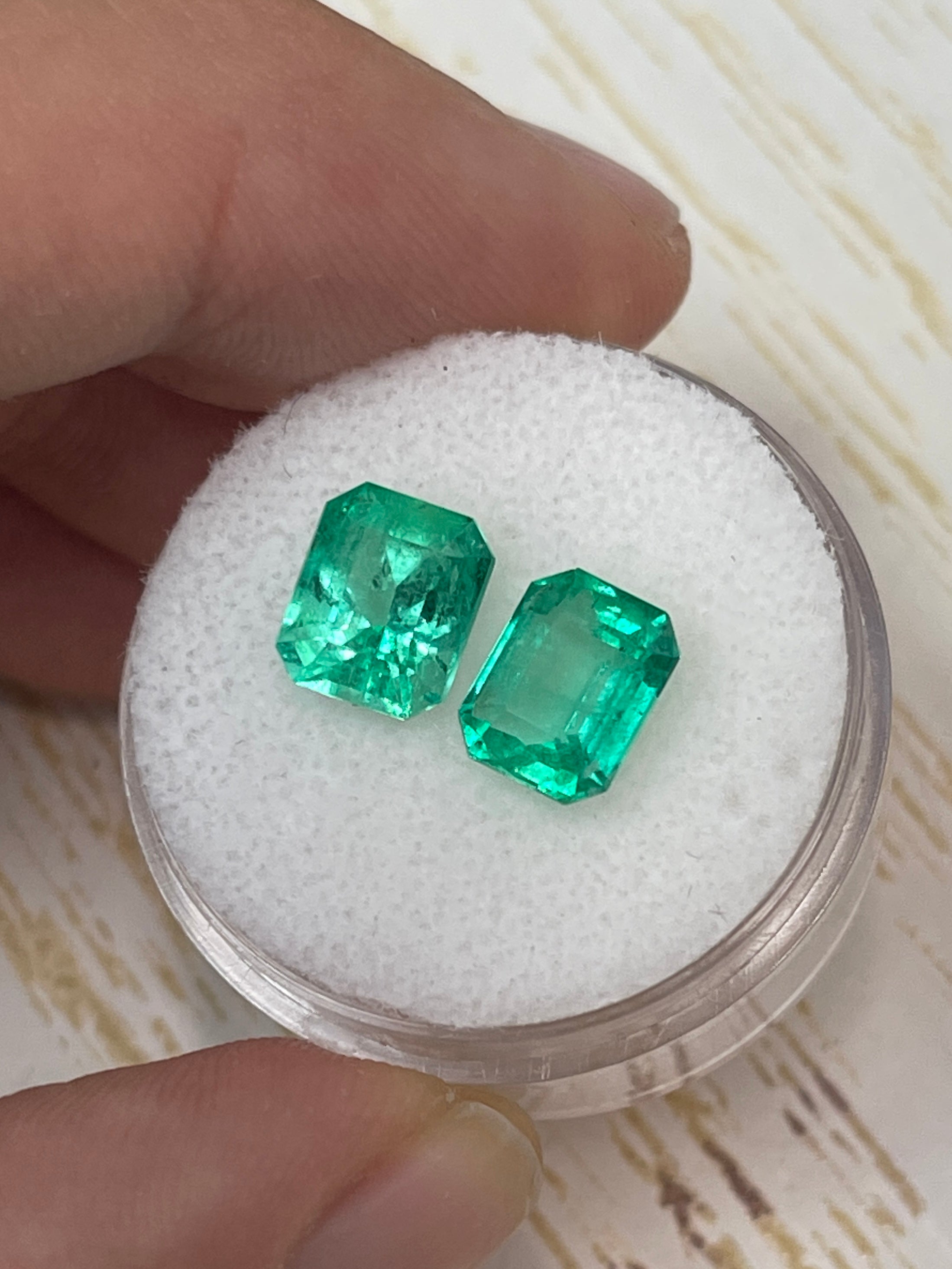 Matching green Colombian emeralds, 3.73tcw, 8x6.5mm emerald cut, loose gemstones from JR Colombian Emeralds.