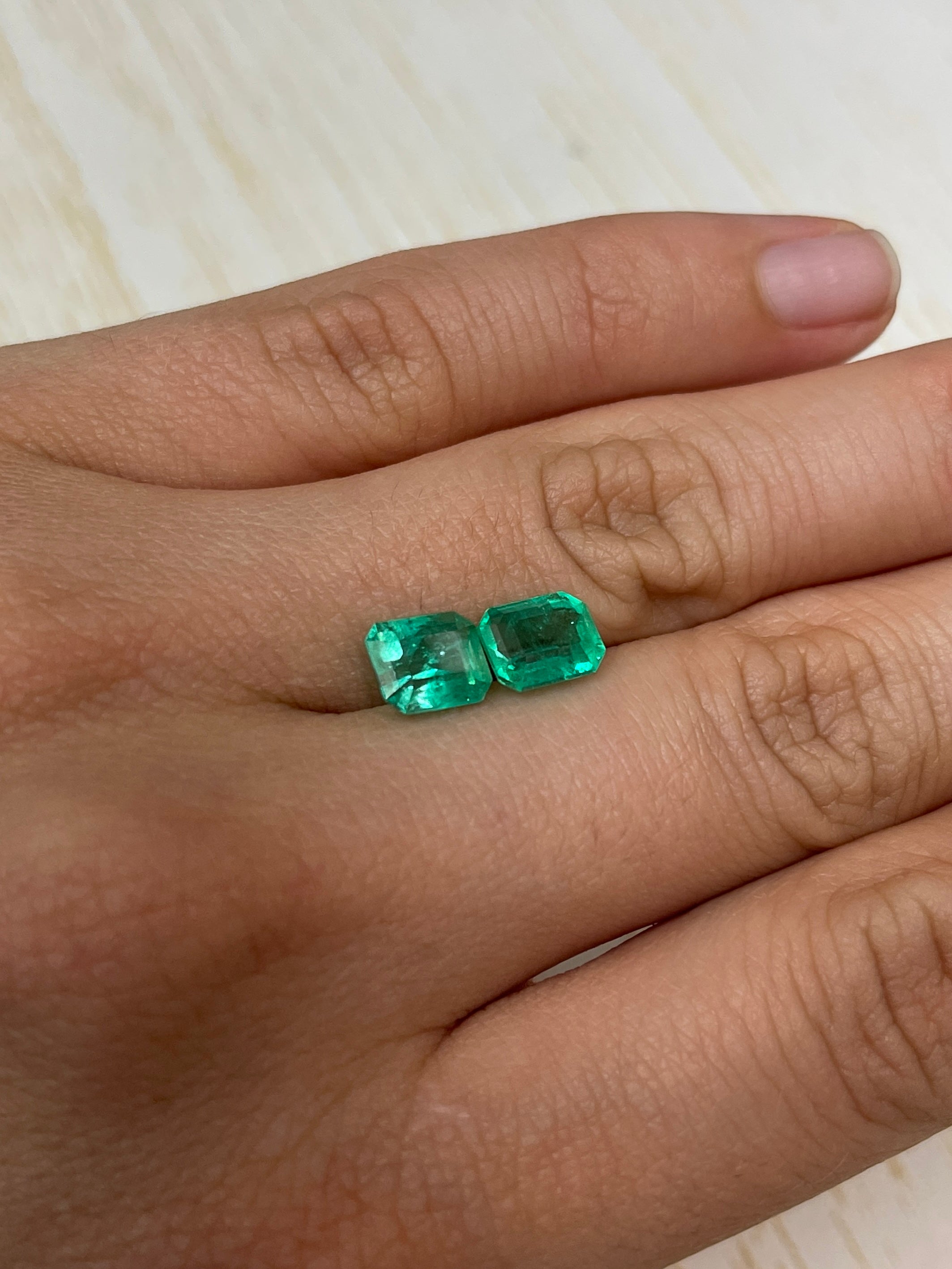Three 3.73 carat total weight matching Colombian emeralds in emerald cut, loose green gemstones from JR Colombian Emeralds.