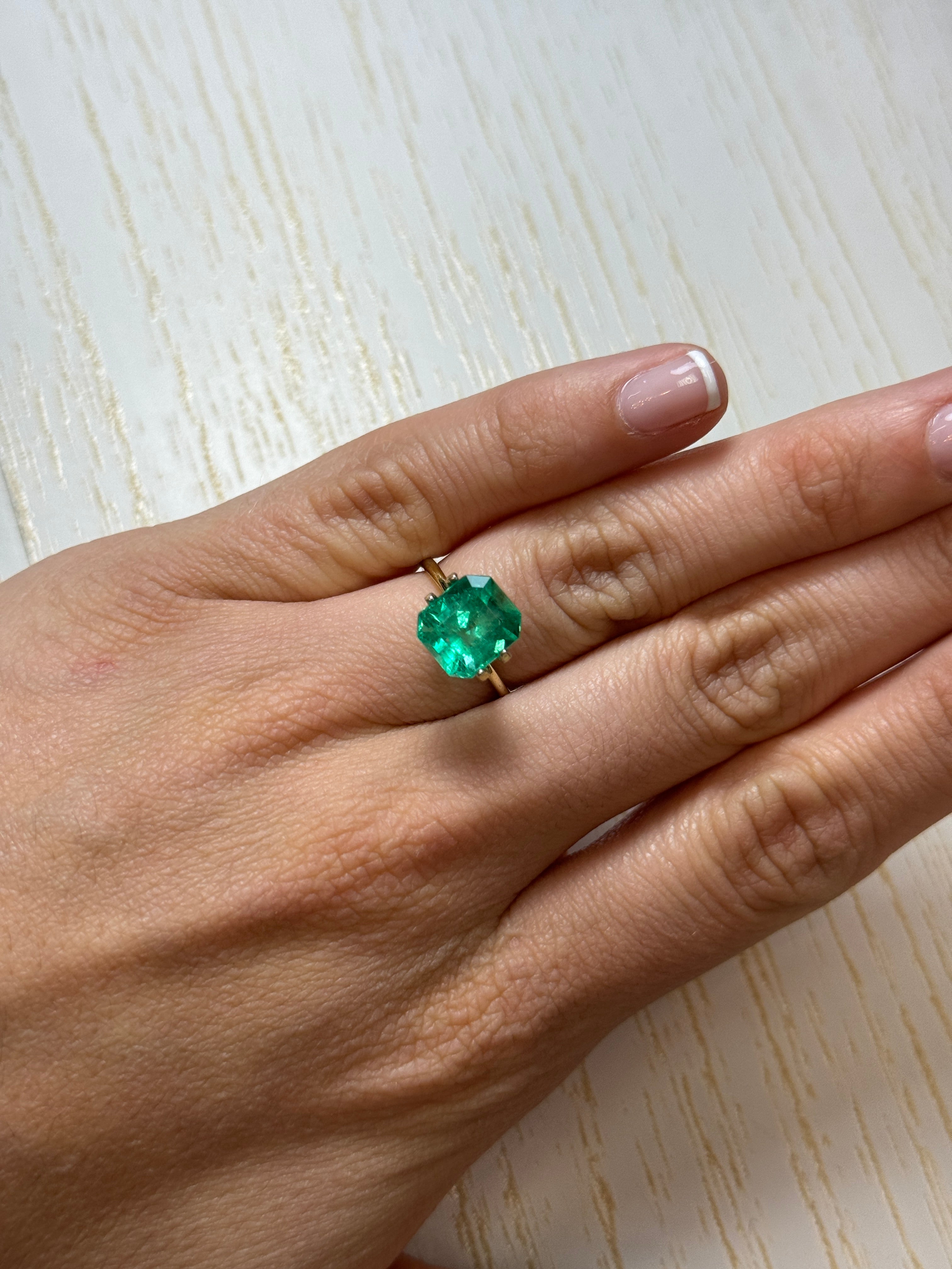 10x9mm glowing green natural Colombian emerald loose gemstone, emerald cut, 3.80 carats from JR Colombian Emeralds.