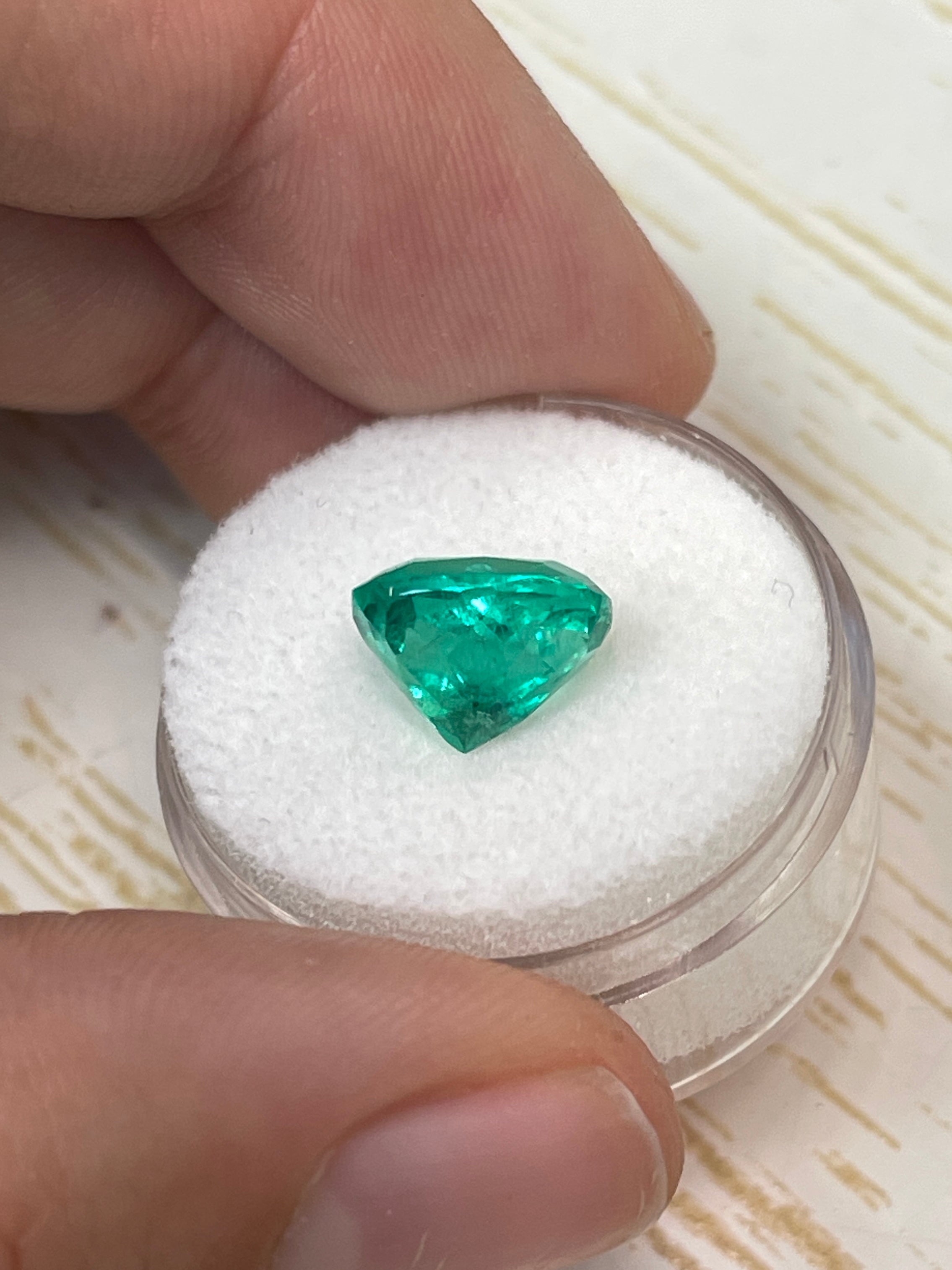 Loose 3.84 carat Colombian emerald with cushion cut, intense medium green color, natural gemstone from JR Colombian Emeralds.