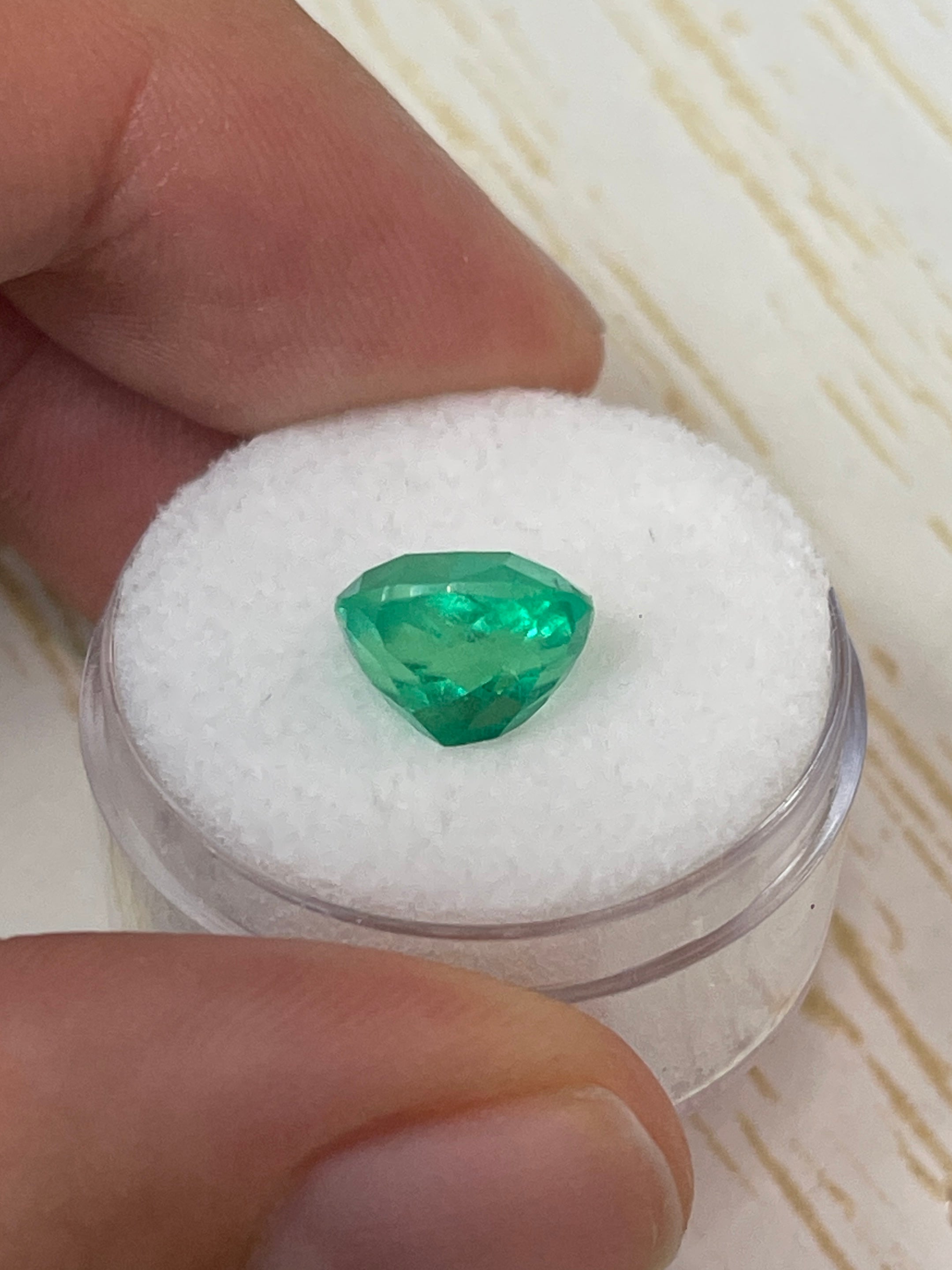 Bright yellowish green 3.85 carat natural Colombian emerald loose cushion cut gemstone by JR Colombian Emeralds.