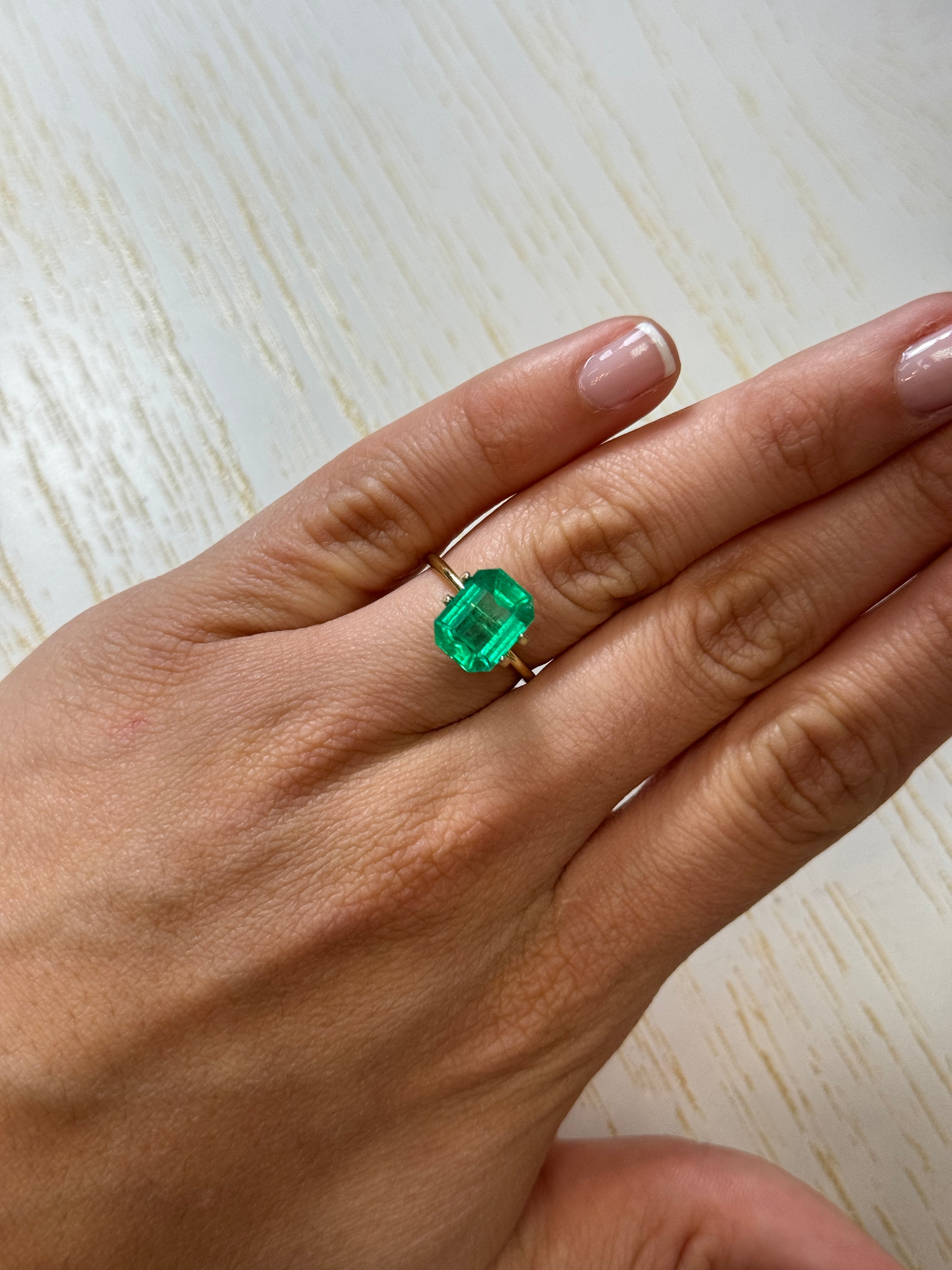 3.88 carat natural Colombian emerald loose gemstone, emerald cut with glowing green color, from JR Colombian Emeralds