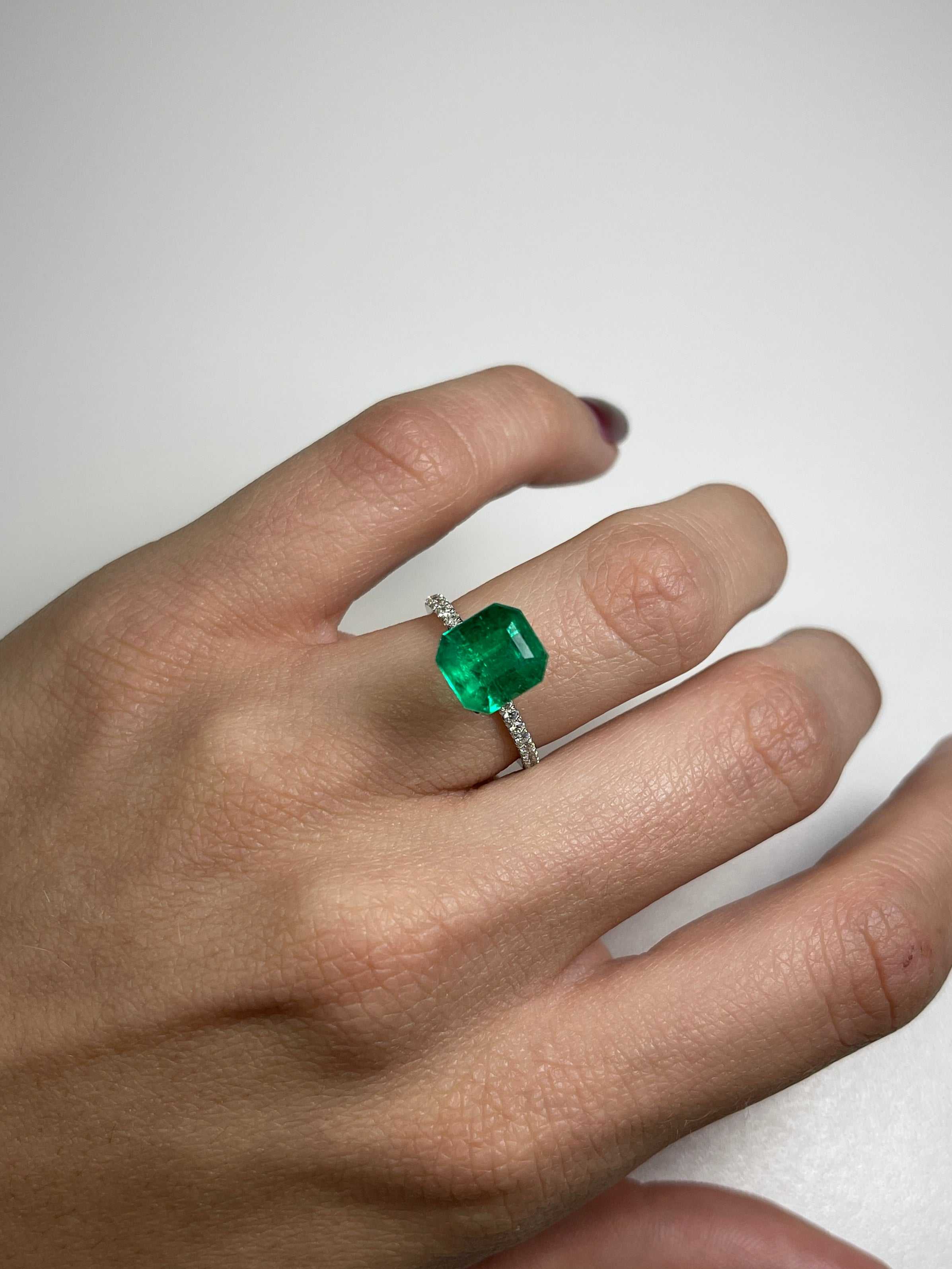 Vivid 3.90 Carat AAA Colombian Emerald in emerald cut, natural loose gemstone from JR Colombian Emeralds on display.