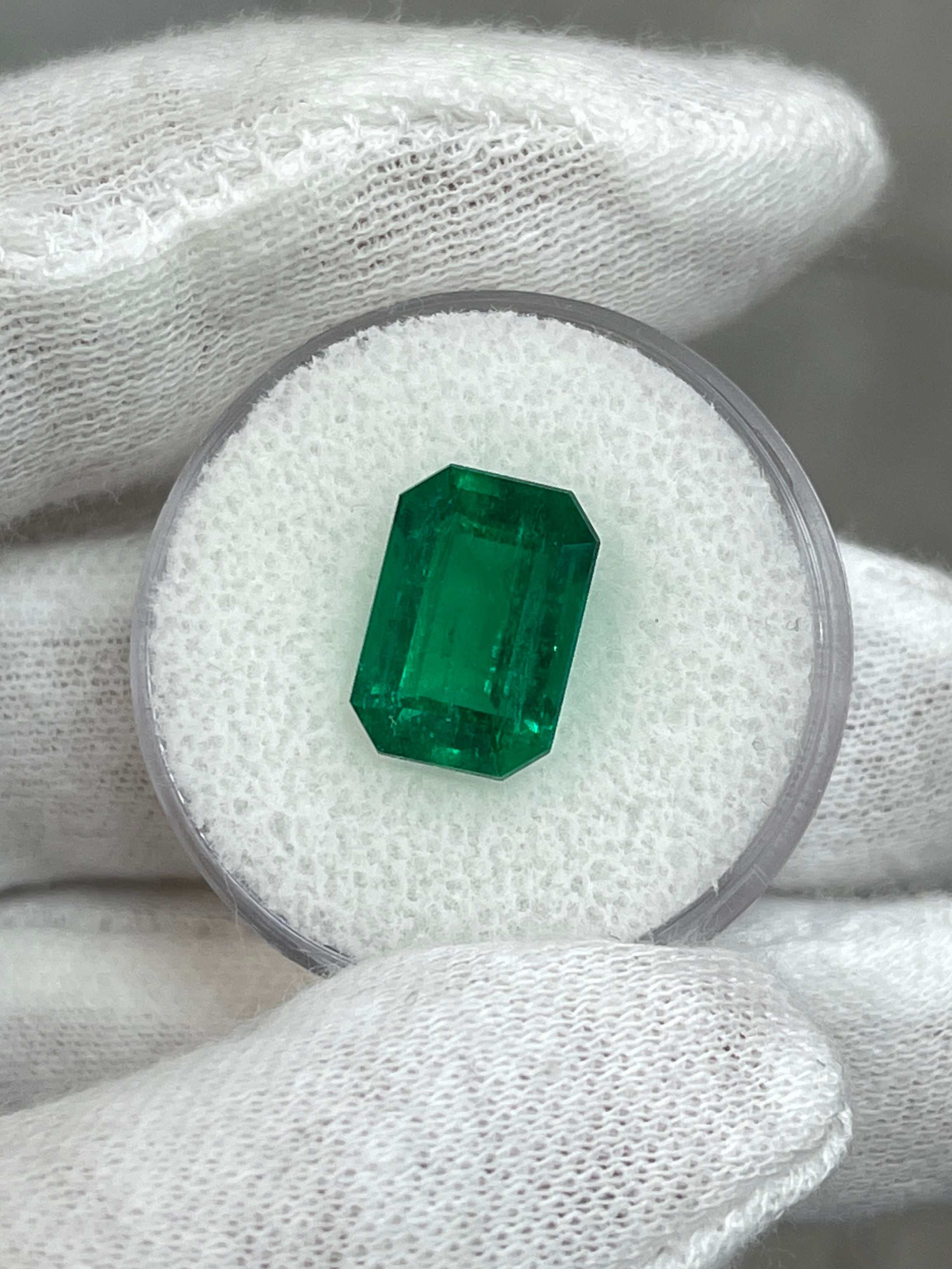 Vivid green 3.95 carat Colombian emerald cut emerald, GIA certified, loose gemstone from JR Colombian Emeralds.