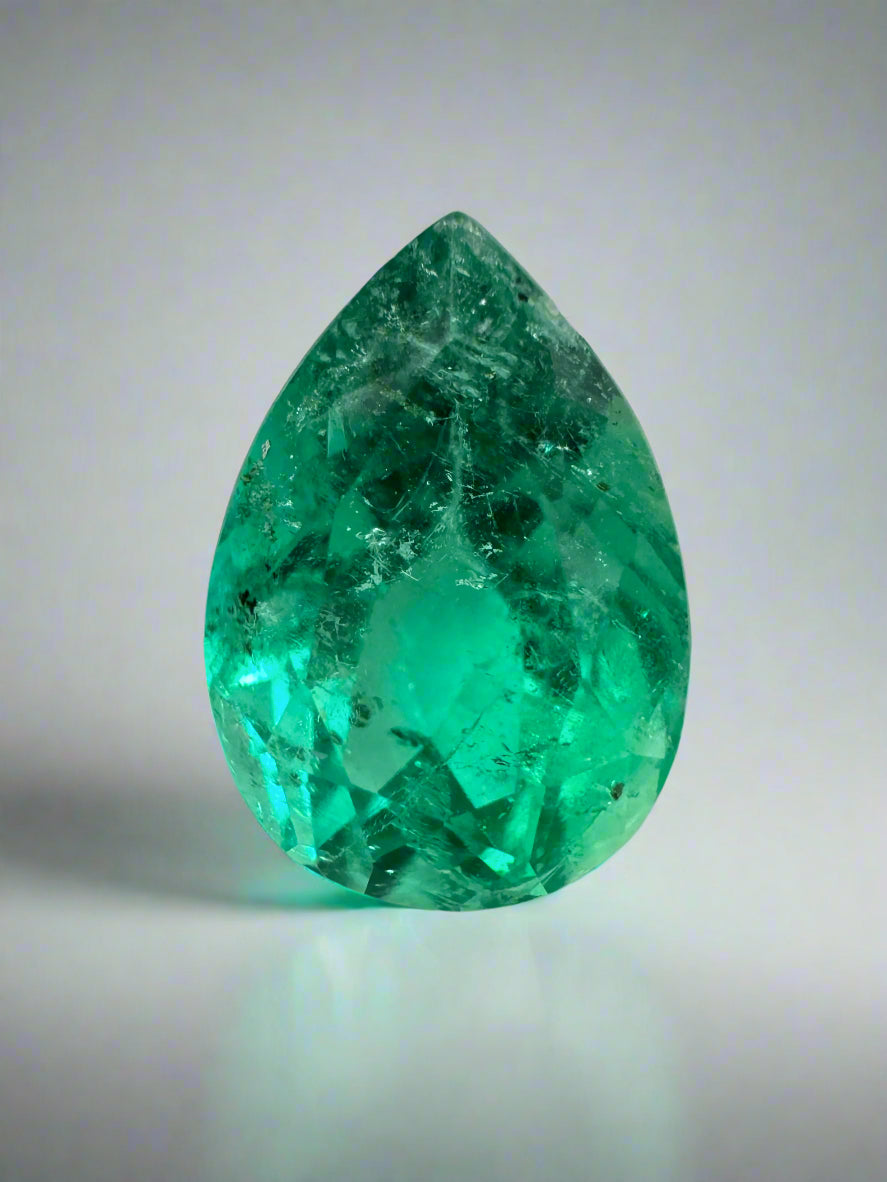 4.09 Carat 12x9 Freckled Bluish Green Pear Loose Colombian Emerald - JR Colombian Emeralds
