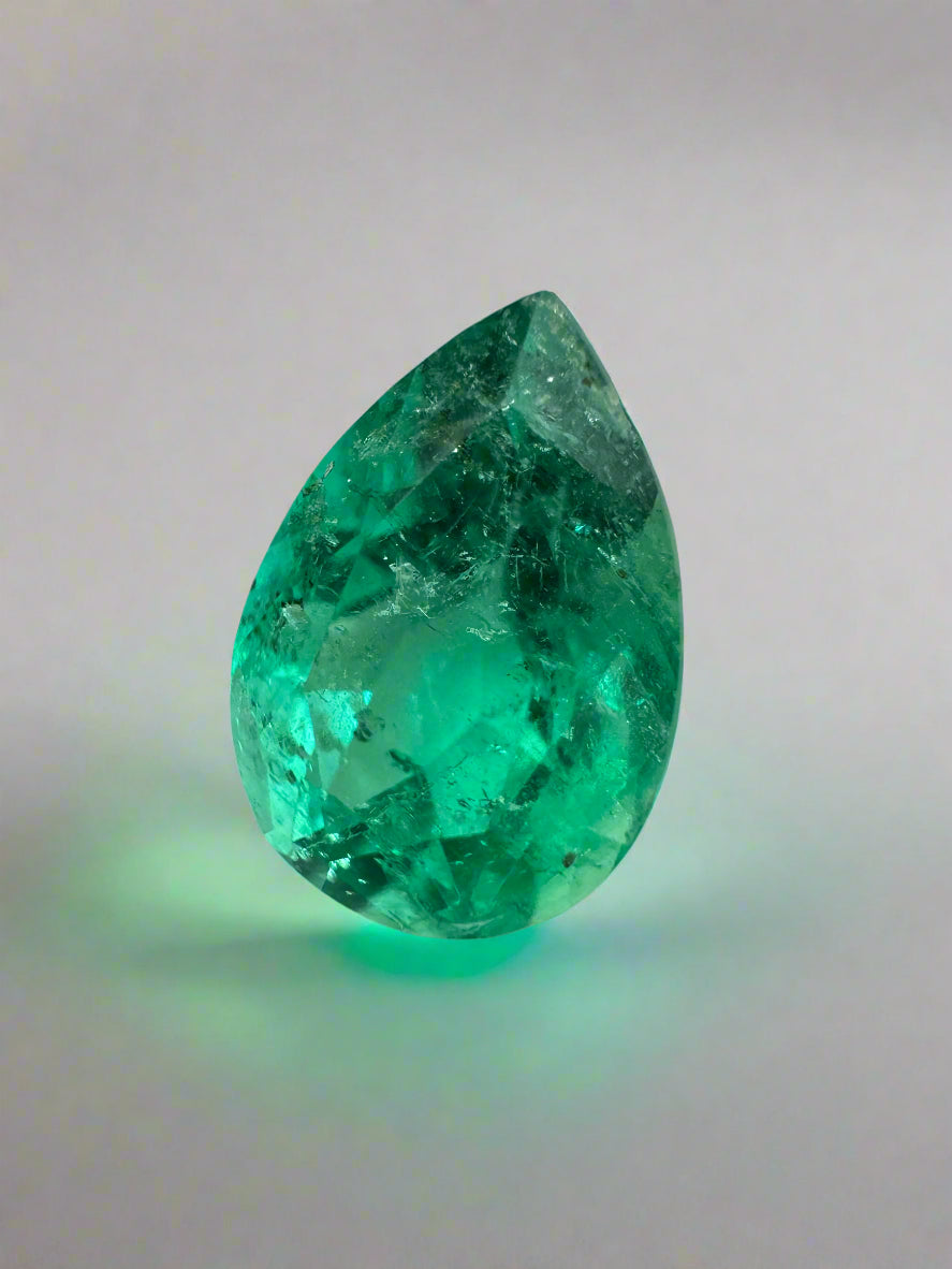 4.09 Carat 12x9 Freckled Bluish Green Pear Loose Colombian Emerald - JR Colombian Emeralds