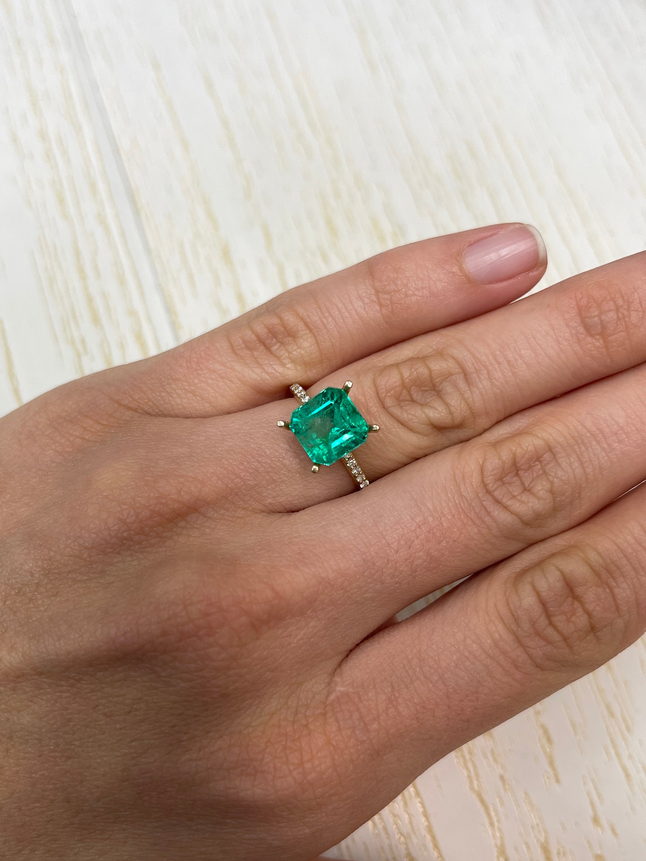 Vivid 4.22 carat natural Colombian Muzo emerald loose gemstone in Asscher cut, showcasing deep green color and clarity