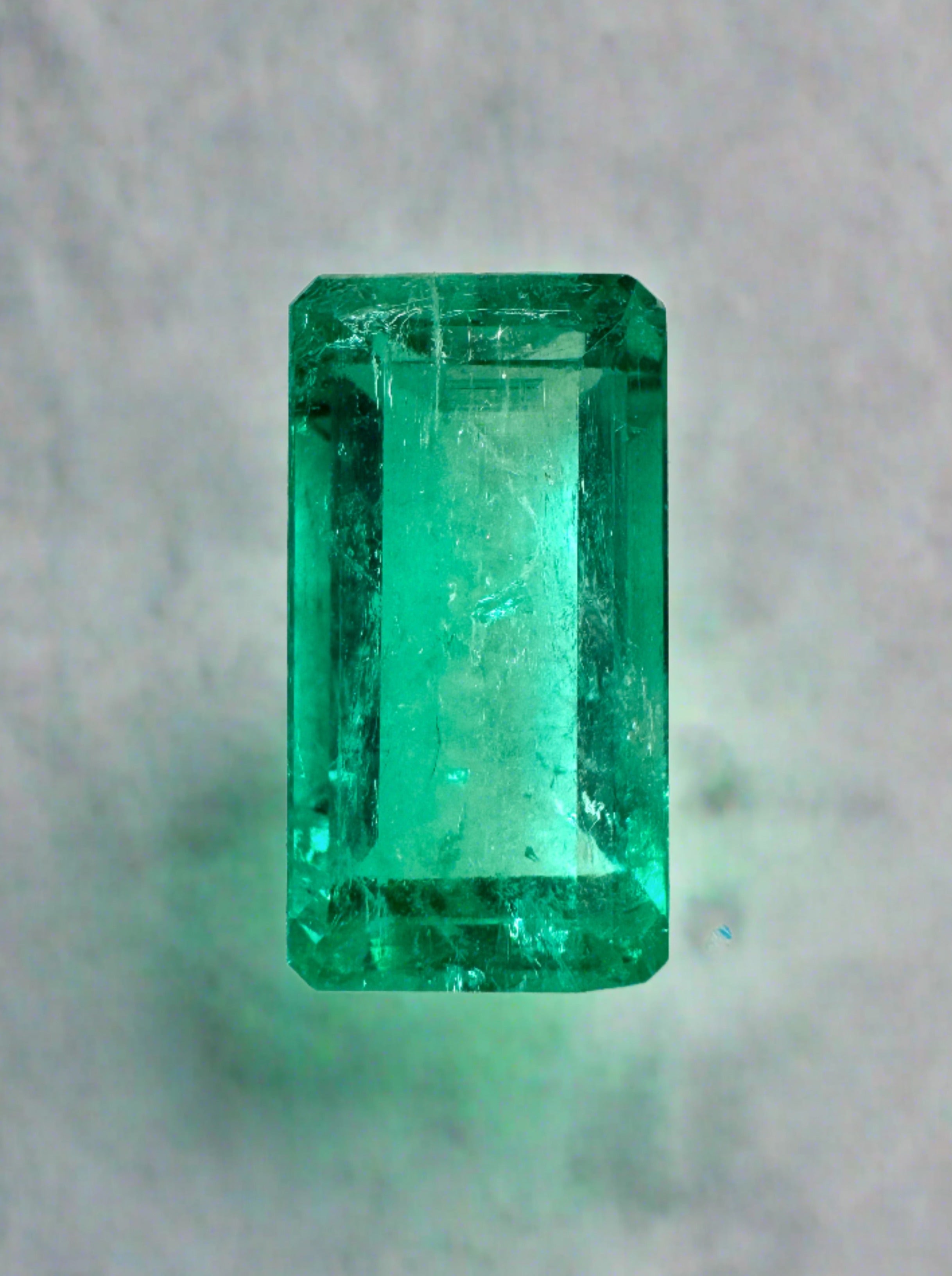 Vivid bluish green 4.26 carat natural Colombian emerald in elongated emerald cut, loose gemstone from JR Colombian Emeralds
