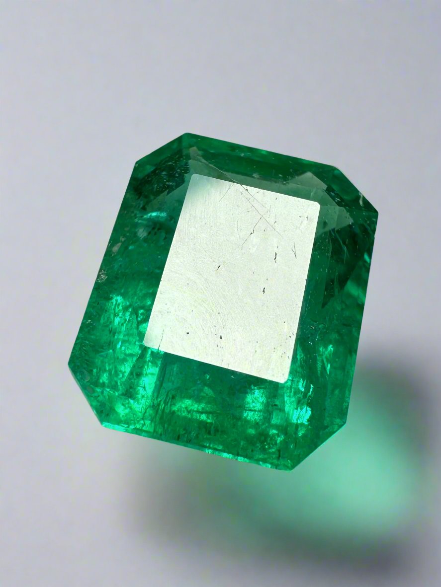 Deep green 4.36 carat natural Zambian emerald cut loose gemstone from JR Colombian Emeralds, 11x9 mm size.