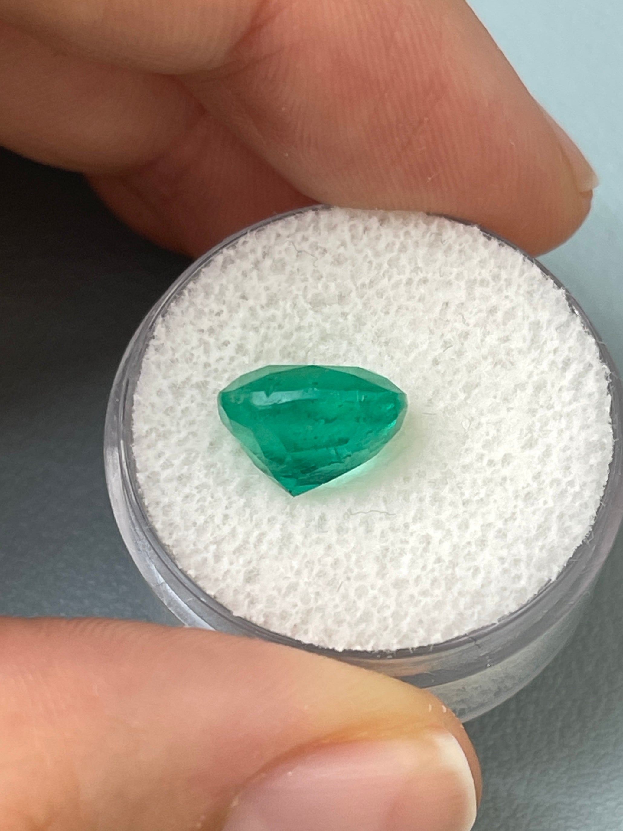 Deep green 4.37 carat natural Colombian emerald loose cushion cut gemstone with natural inclusions, from JR Colombian Emeralds.