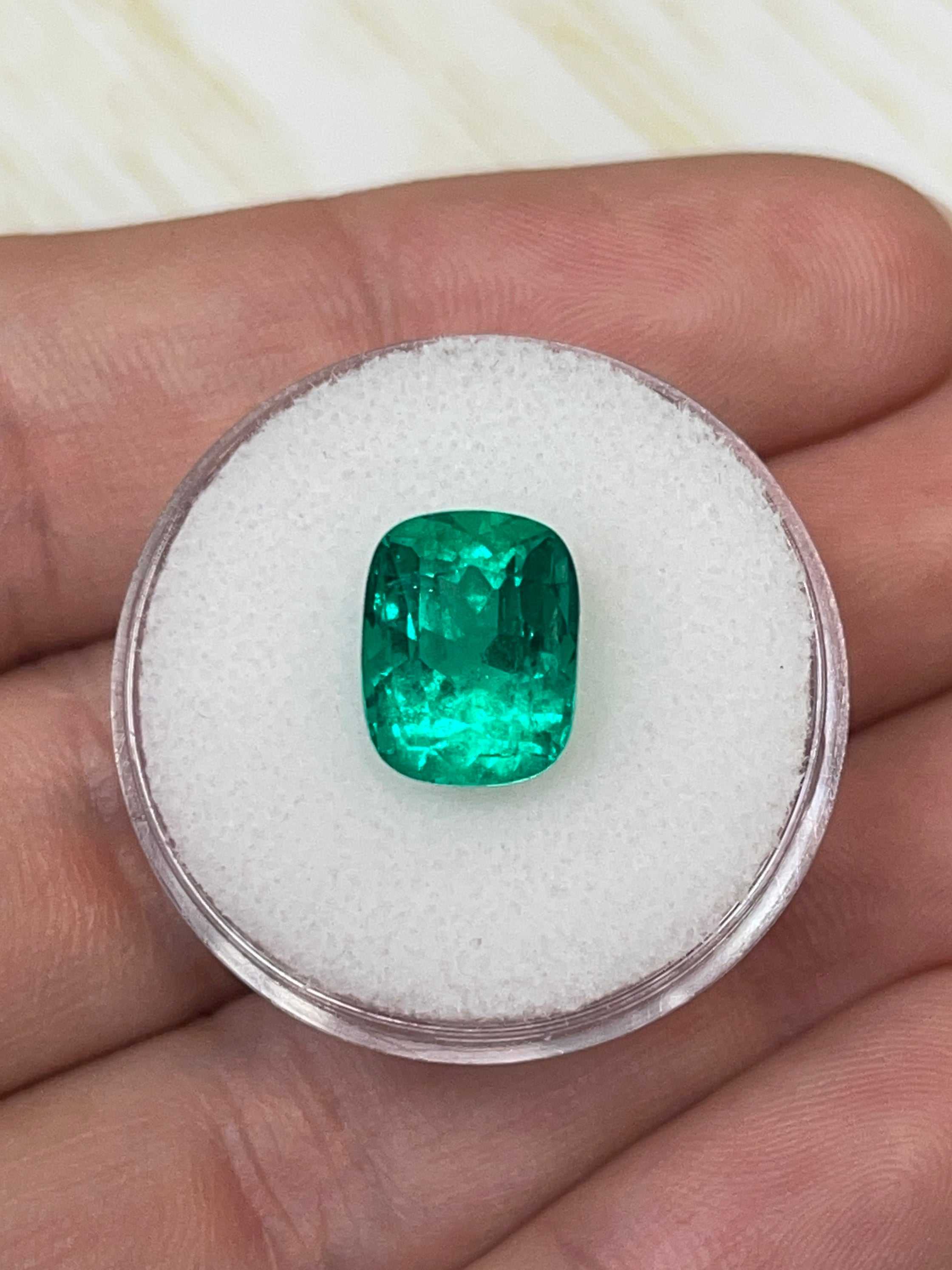 Vivid 4.38 carat Muzo green Colombian emerald loose cushion cut gemstone from JR Colombian Emeralds.