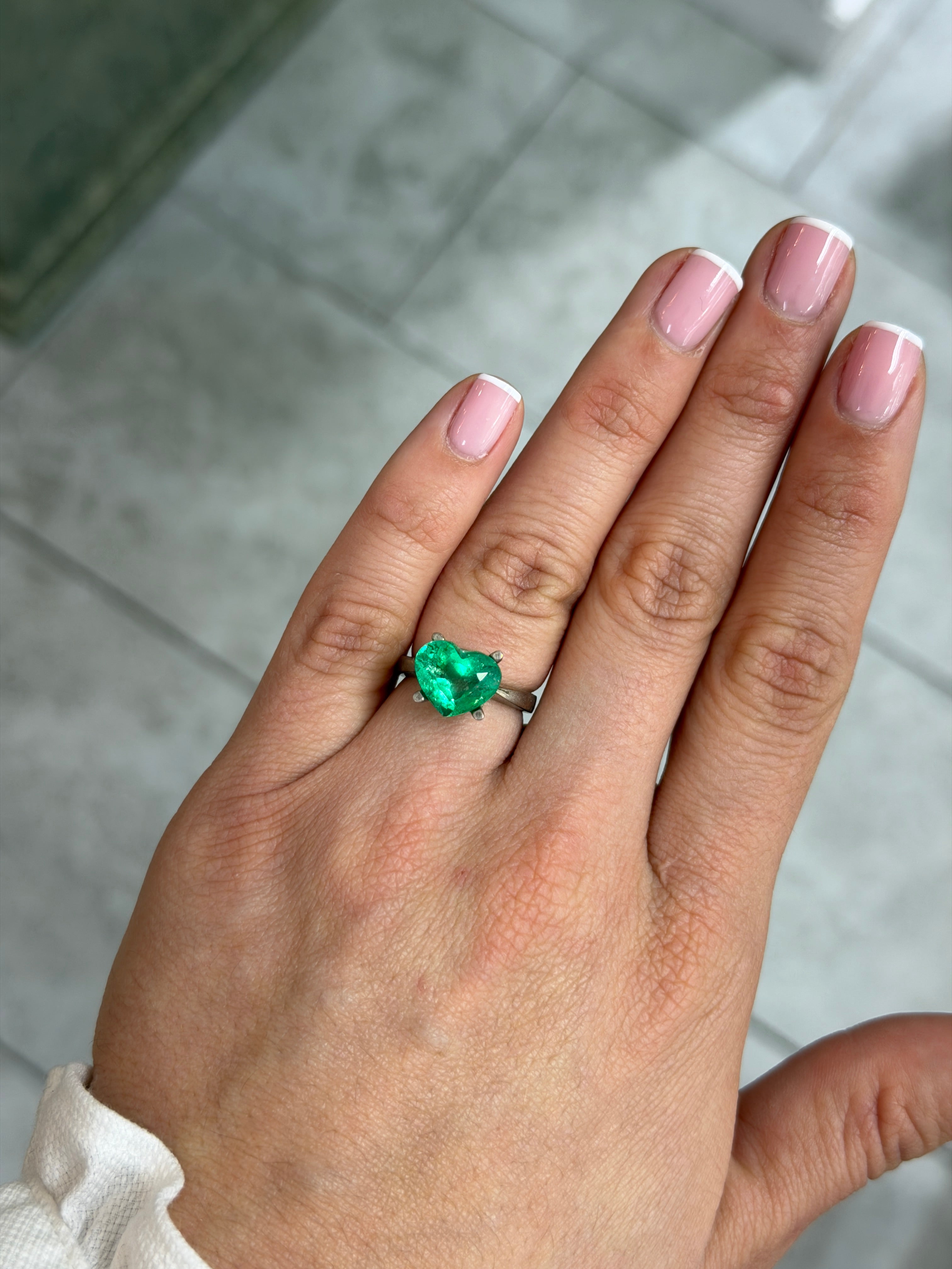 Natural 4.40 carat glowing green Colombian emerald loose heart cut gemstone by JR Colombian Emeralds.