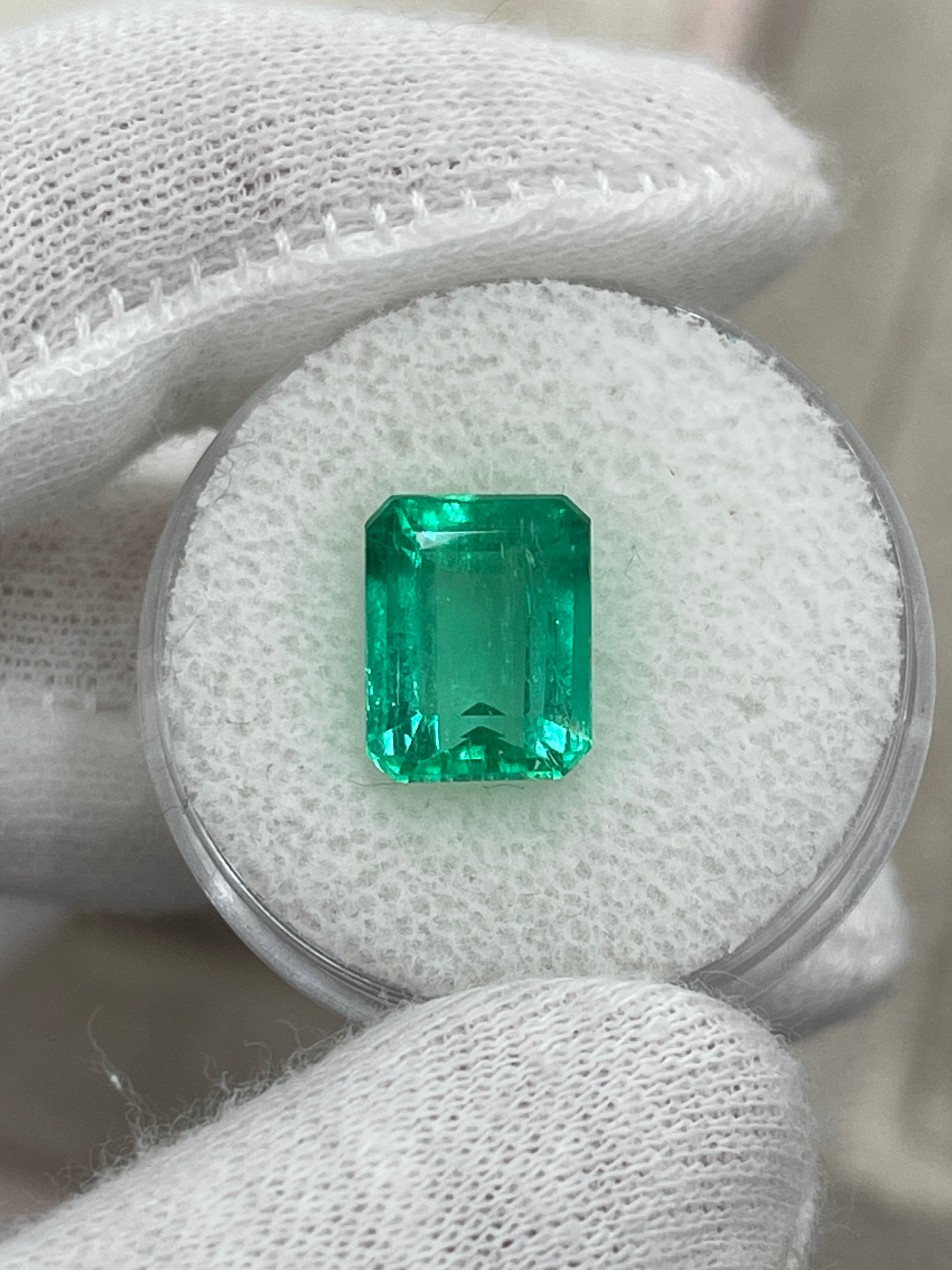 4.43 carat Jyotish green Colombian emerald loose gemstone in emerald cut, natural and vibrant green from JR Colombian Emeralds.