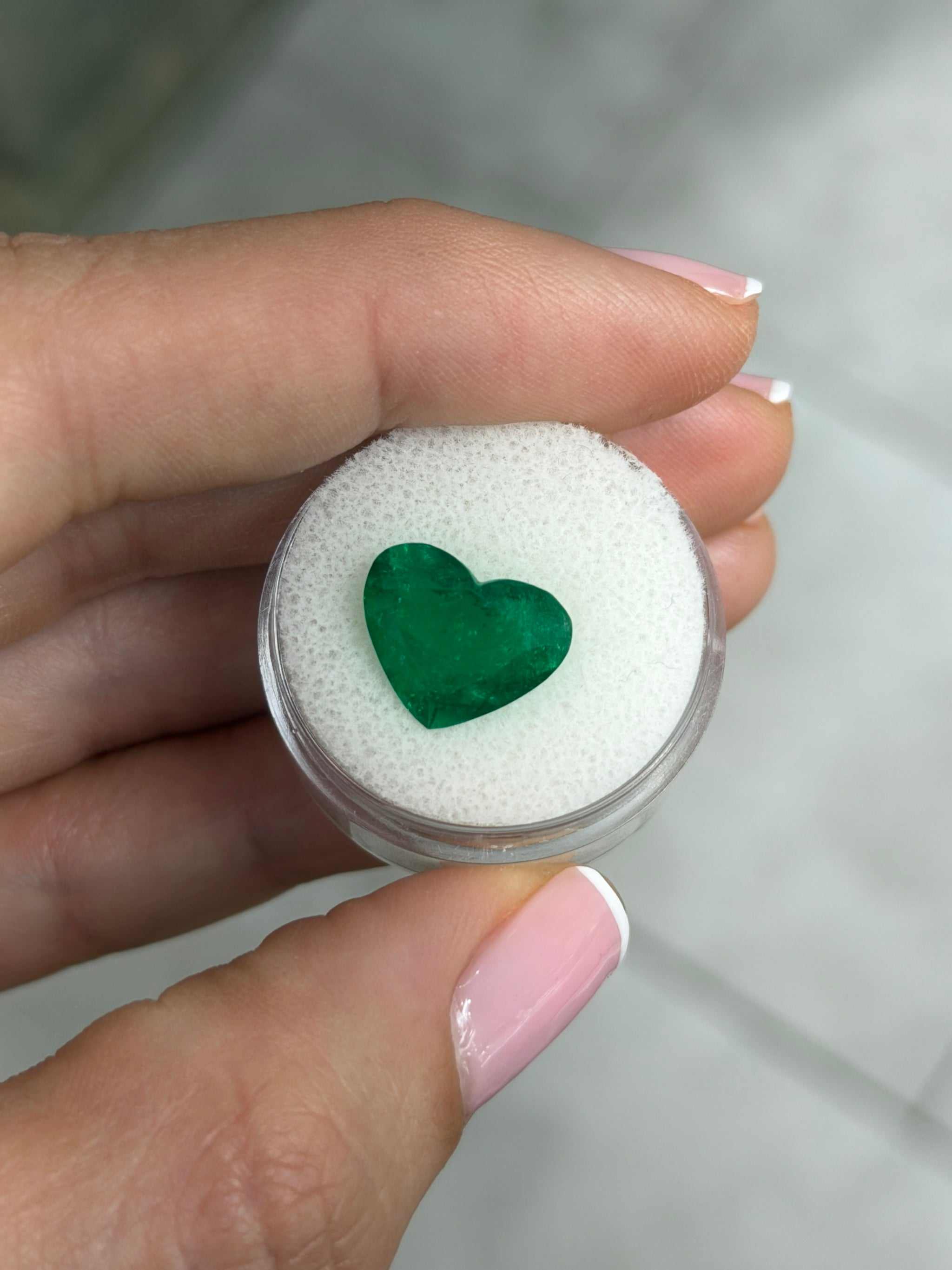 4.46 carat natural Colombian emerald heart cut loose gemstone with intense green color, AAA+ quality from JR Colombian Emeralds