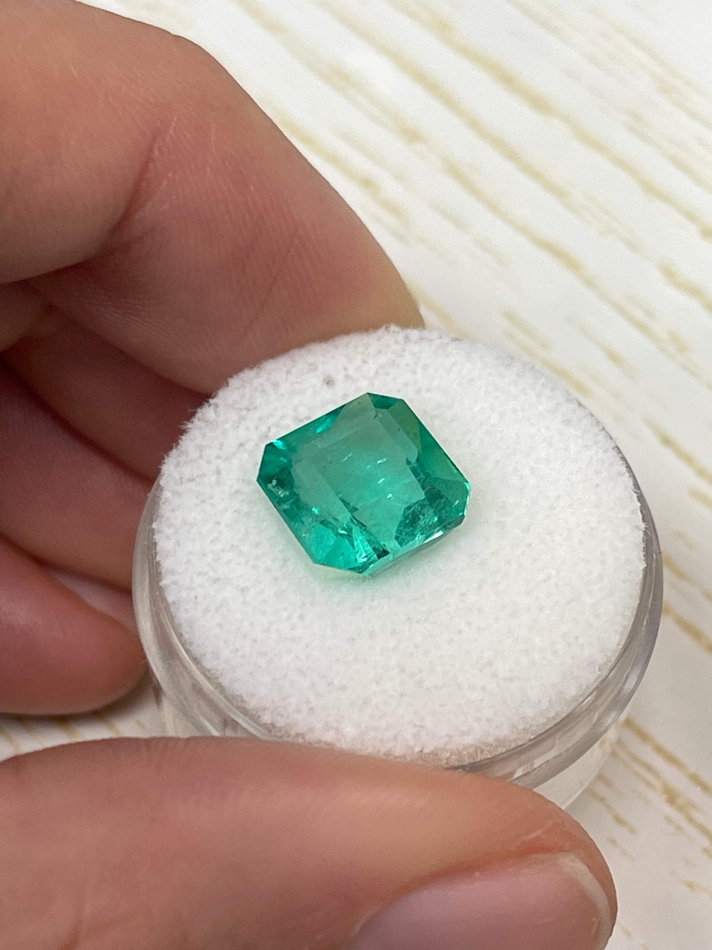 Vibrant 4.53 carat loose Colombian emerald Asscher cut gemstone from JR Colombian Emeralds.