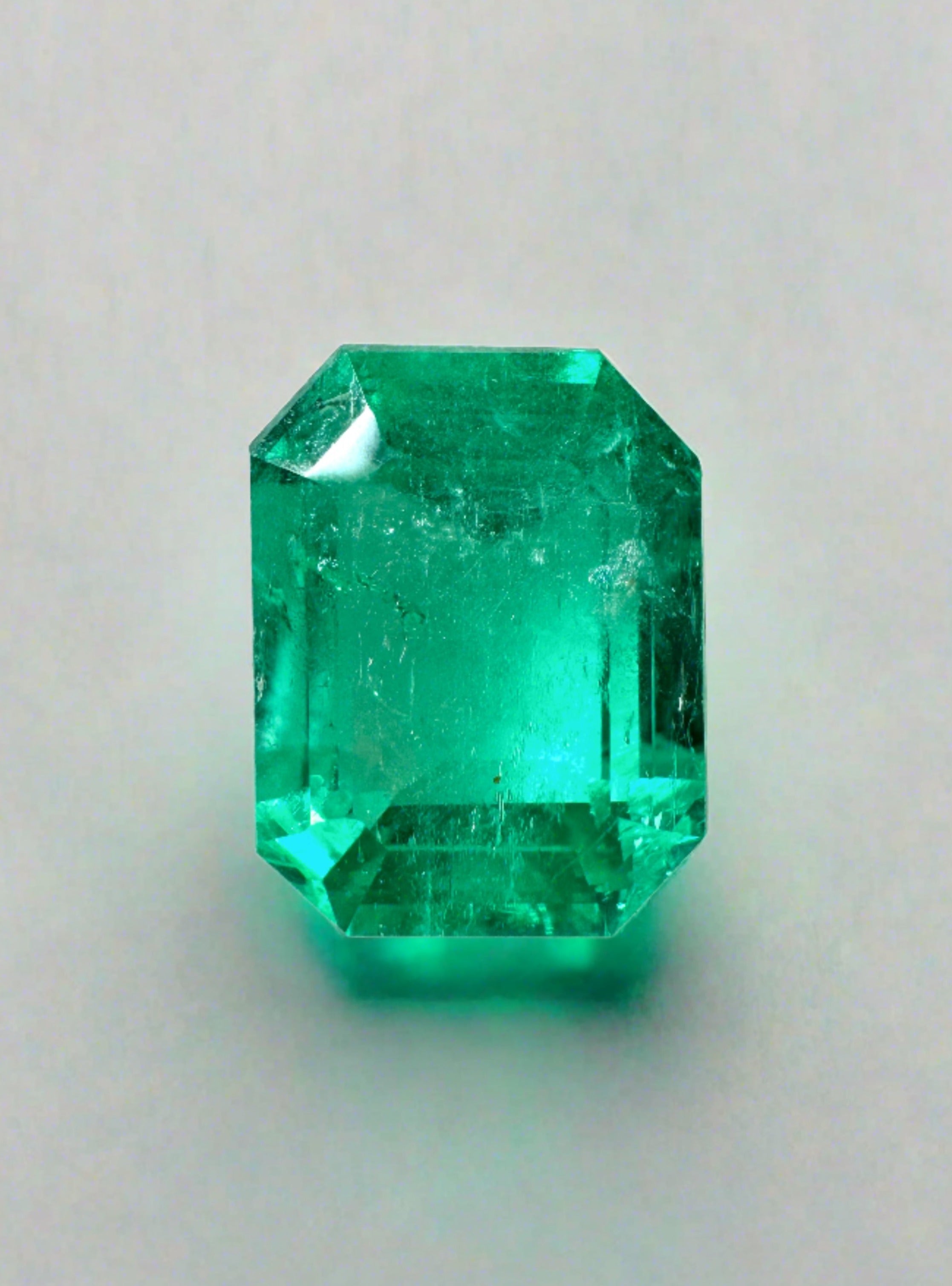 4.64 carat bluish green Colombian emerald loose gemstone in 11x9 mm emerald cut, from JR Colombian Emeralds.