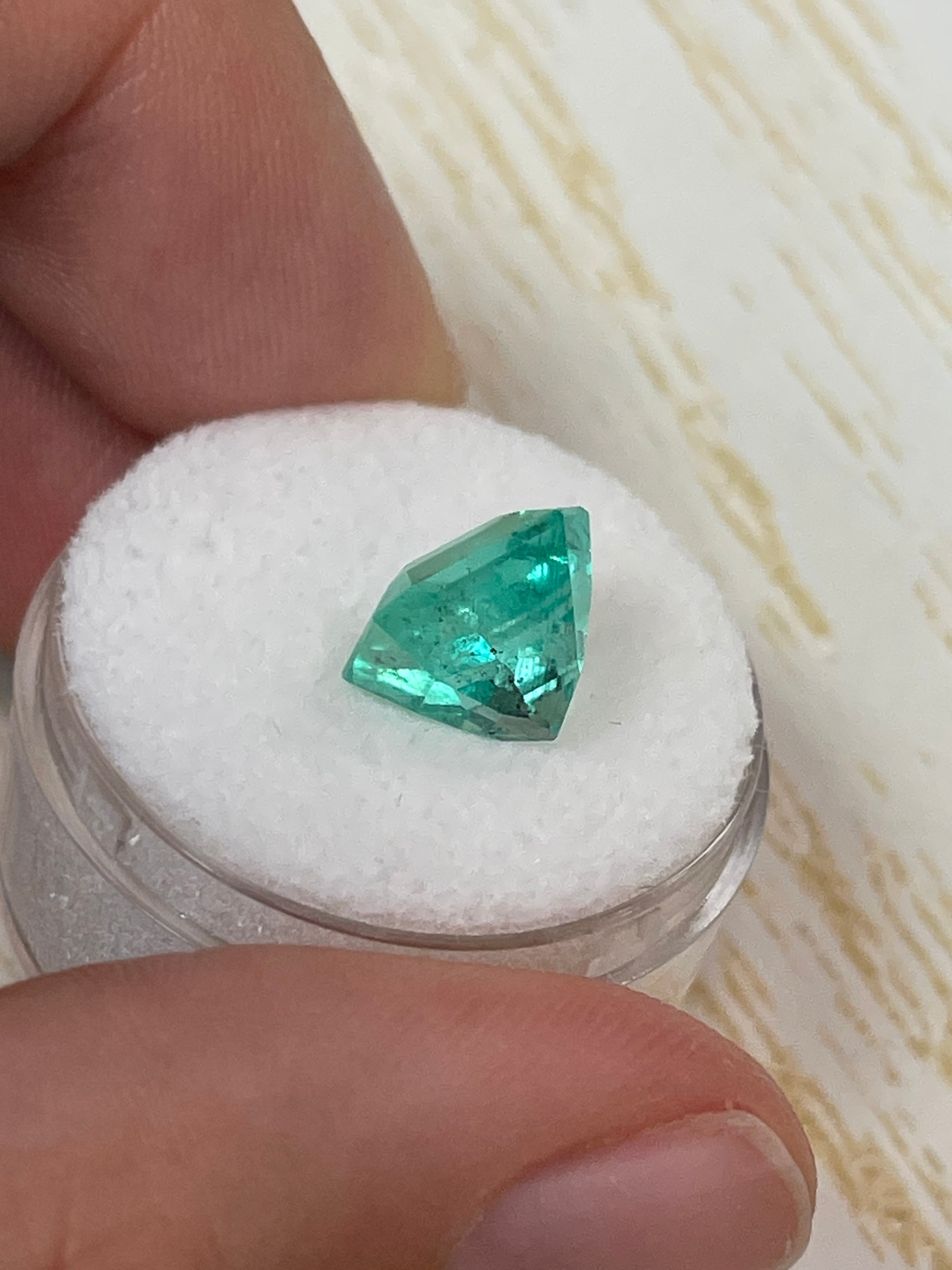 4.69 carat freckled Colombian emerald loose gemstone, 10x10mm Asscher cut with clipped corners, from JR Colombian Emeralds.