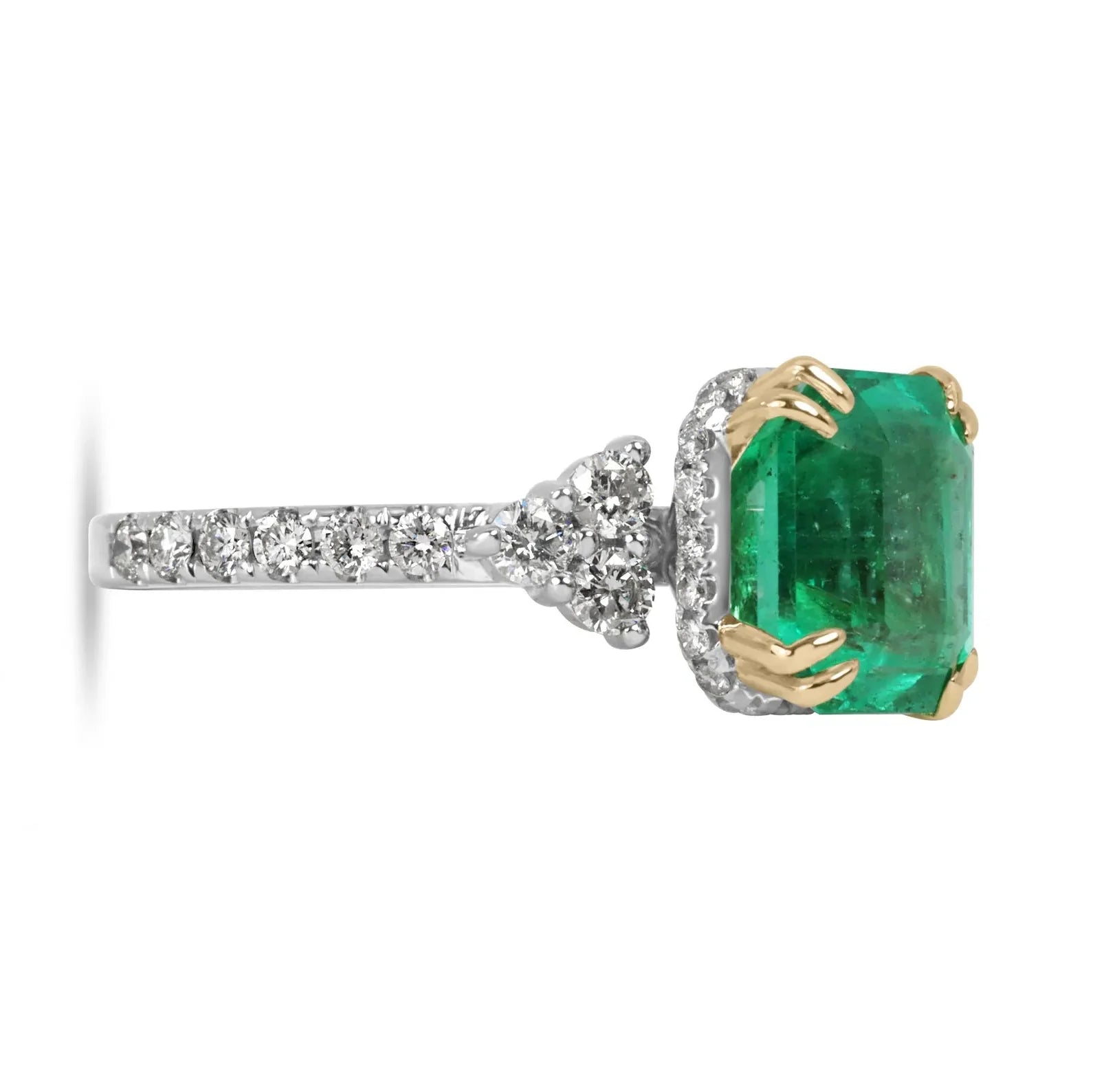4.69tcw Emerald Cut Colombian Emerald 7 Stone with Hidden Diamond Halo & Shank 18K