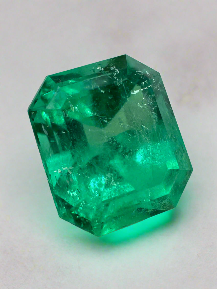 4.82 carat natural Colombian emerald in an emerald cut, rich green color, loose gemstone from JR Colombian Emeralds.