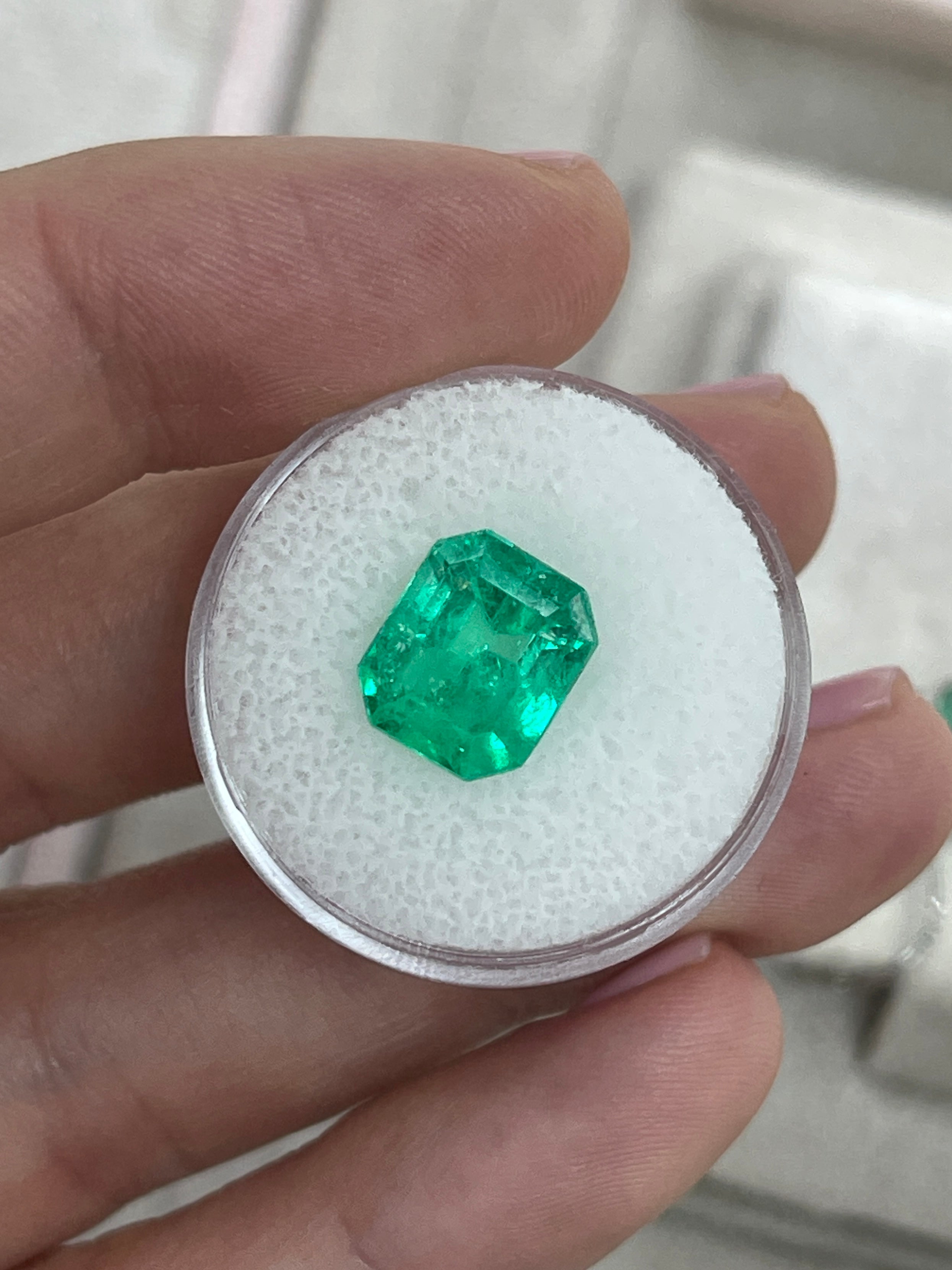 Natural 4.82 carat Colombian emerald loose gemstone, 11x9 mm emerald cut, rich green color, from JR Colombian Emeralds.