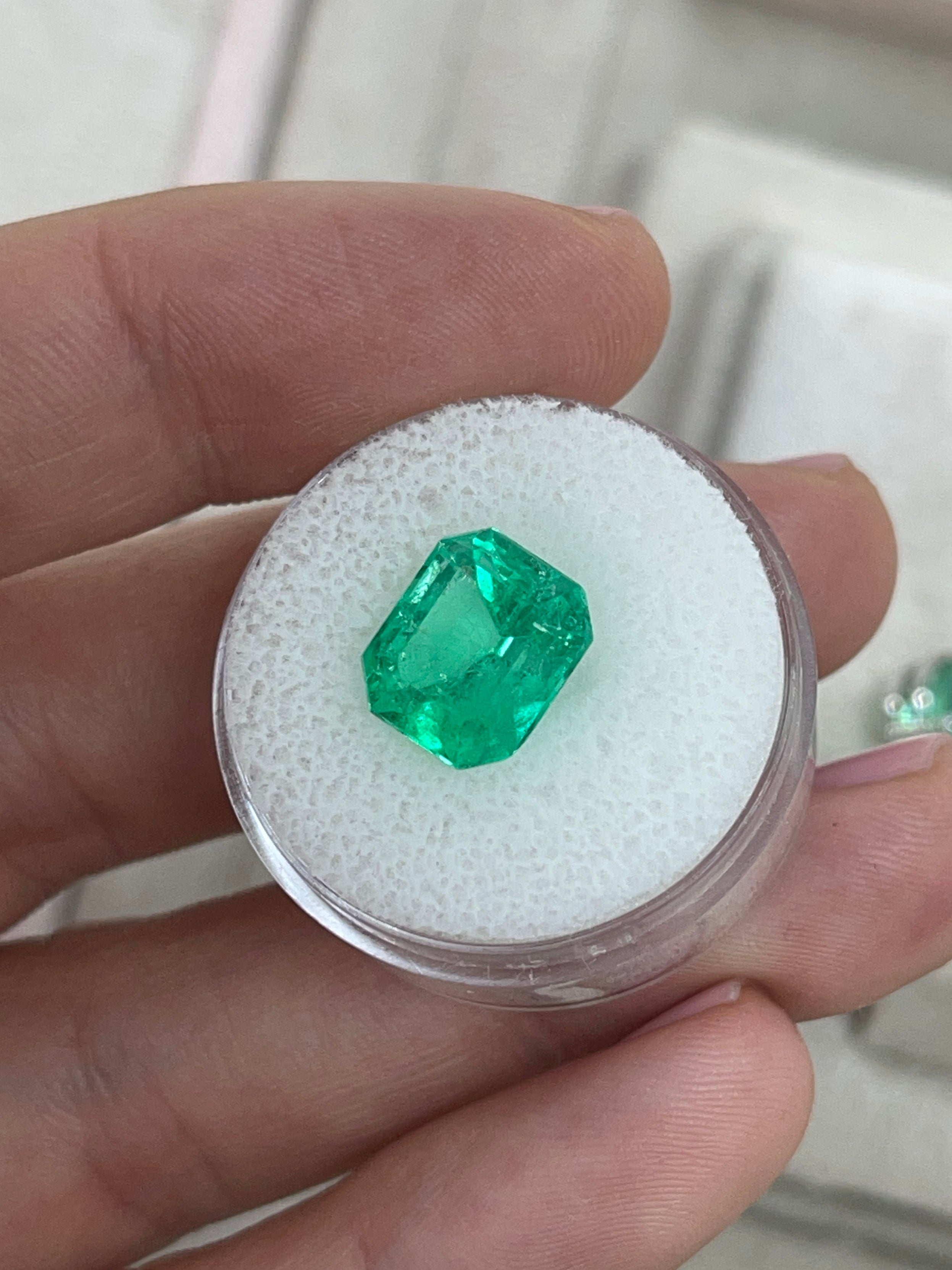 4.82 carat natural Colombian emerald loose gemstone, 11x9 mm emerald cut, rich green color, by JR Colombian Emeralds.