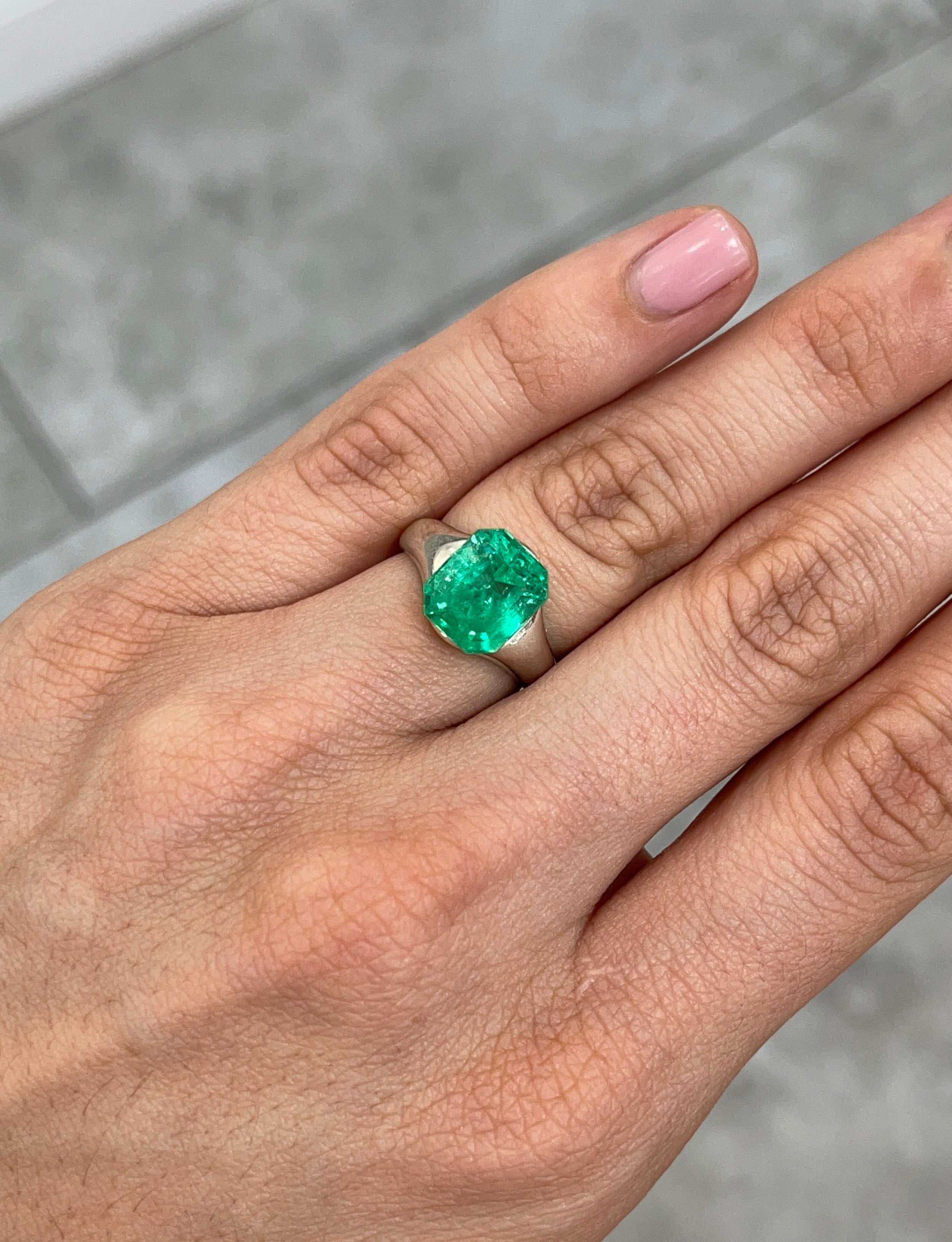 4.82 carat natural Colombian emerald loose gemstone, 11x9mm emerald cut, with rich green color and gemmy clarity.