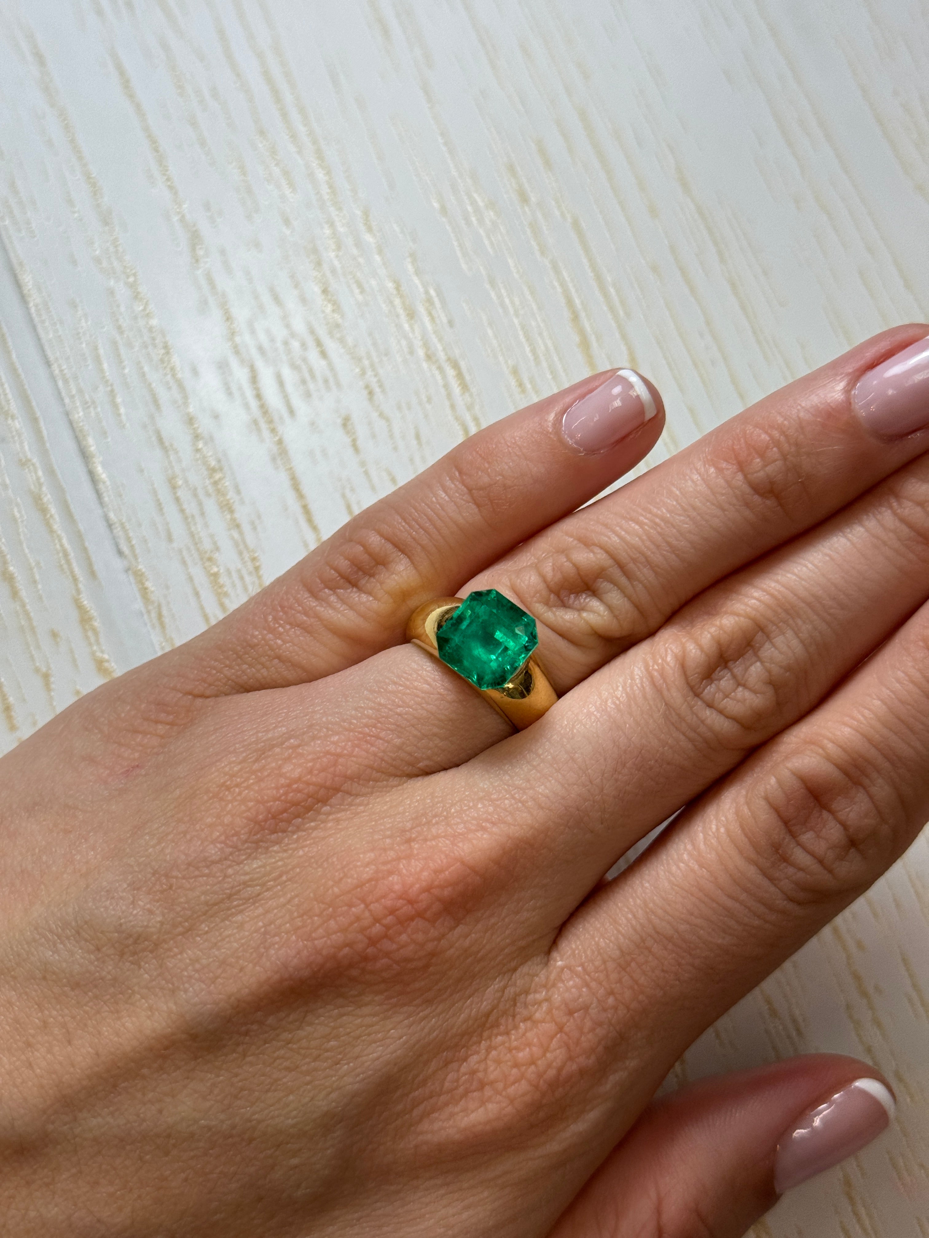 4.83 carat bluish Colombian emerald loose Asscher cut gemstone from JR Colombian Emeralds, showcasing its vibrant color and clarity.