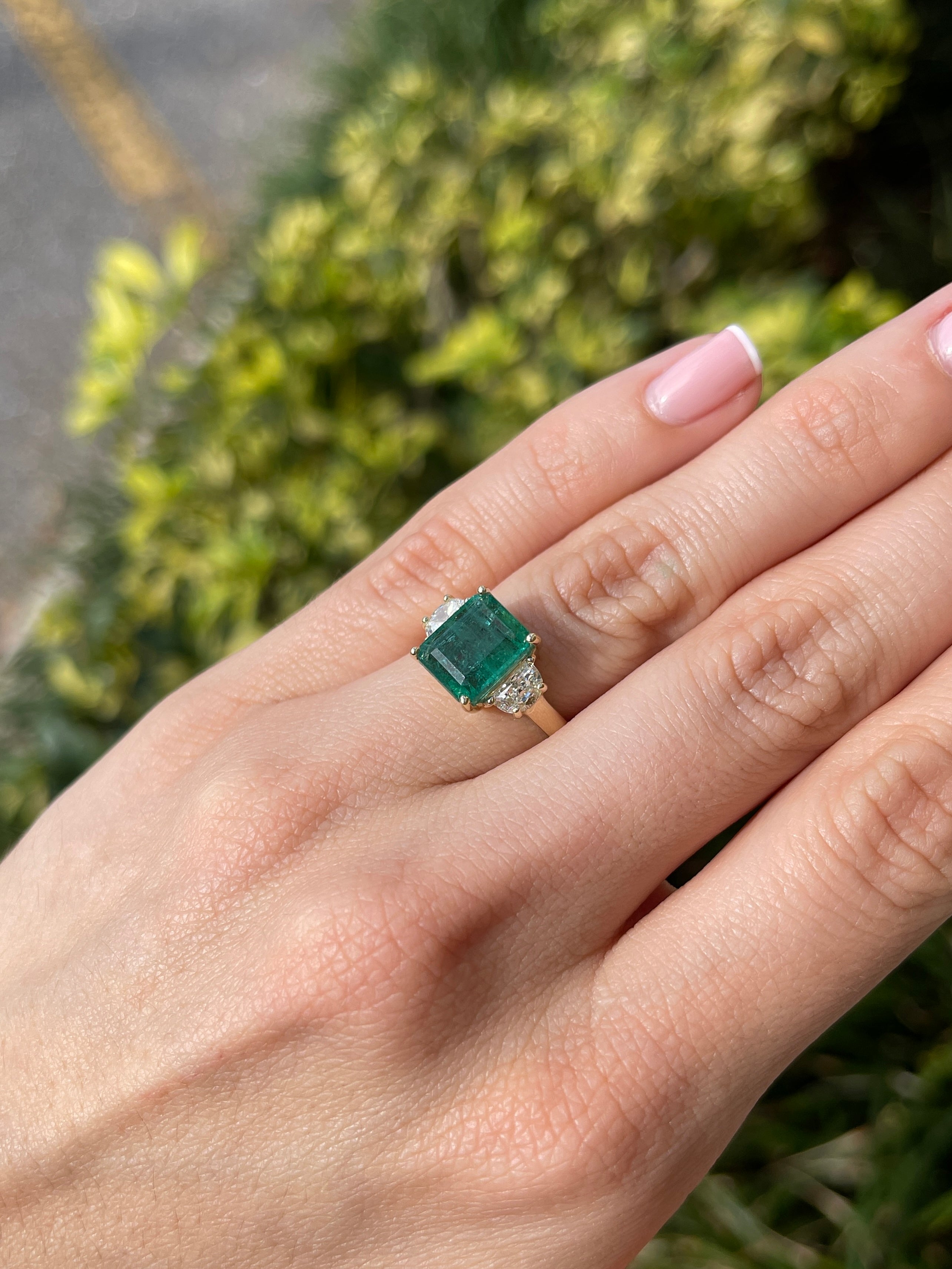 14K gold three-stone ring featuring 4.88tcw natural emerald and lab diamond half moon accents, from JR Colombian Emeralds.