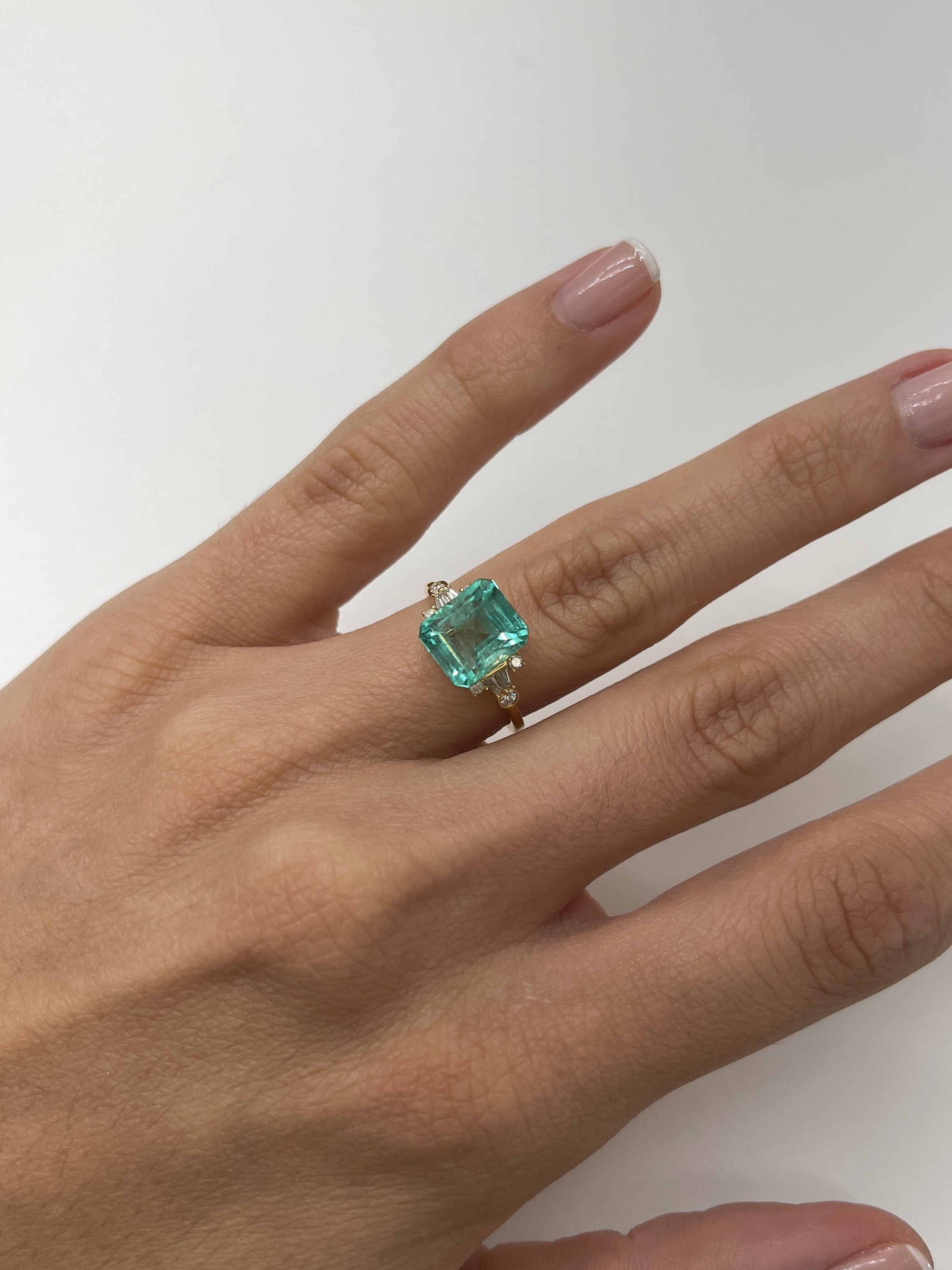 4.91 Carat Colombian Emerald loose gemstone, 10x8.5mm emerald cut, pastel bluish-green, natural and chunky from JR Colombian Emeralds.