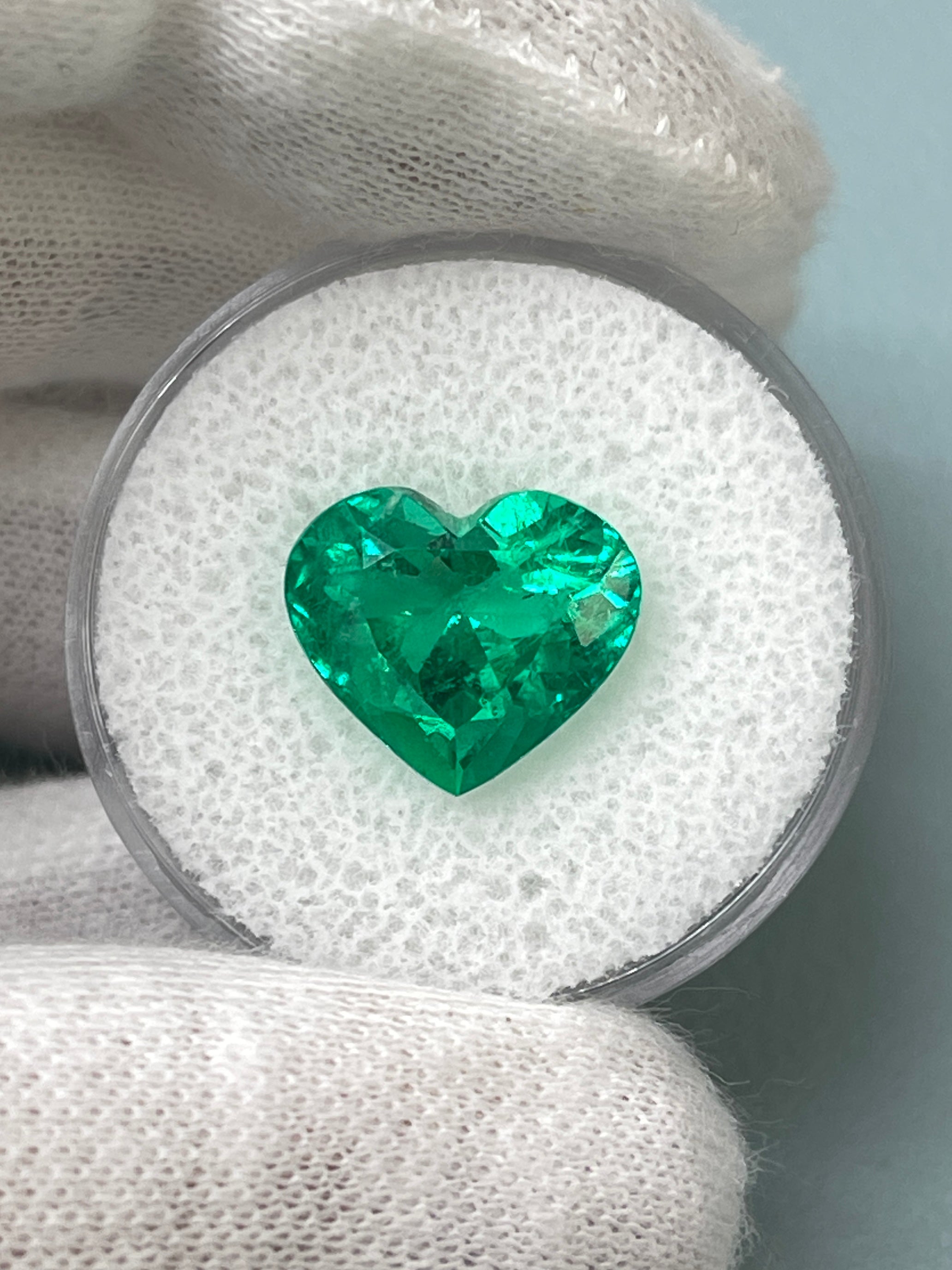Vivid green 4.92 carat natural Colombian emerald heart cut gemstone, AAA+ quality, loose and polished.