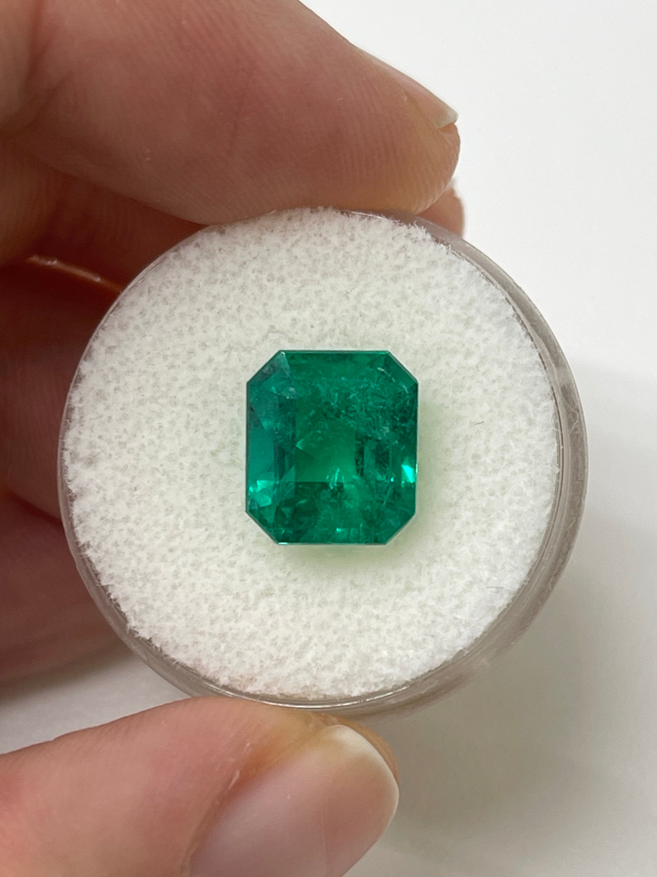 Natural 4.93 carat Colombian emerald loose gemstone in an 11x9 emerald cut, AAA+ investment grade from JR Colombian Emeralds.