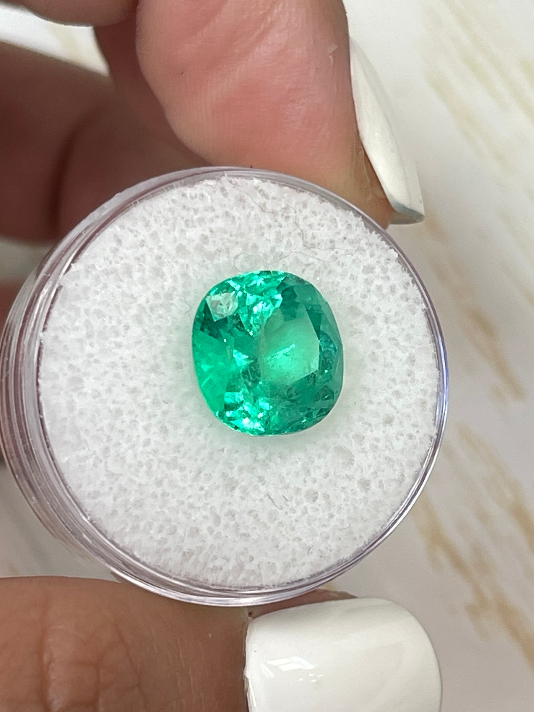 4.94 carat natural Colombian emerald loose gemstone, cushion cut, vibrant green, from JR Colombian Emeralds.