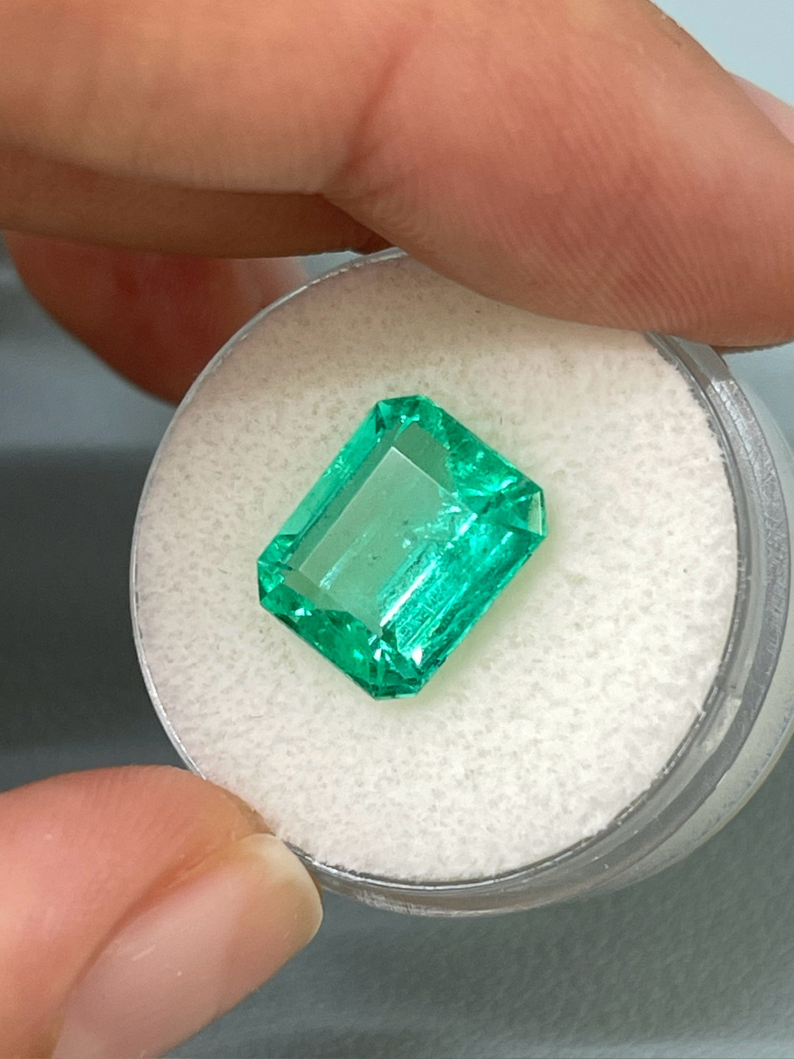 Loose 5.02 carat natural Colombian emerald in classic emerald cut, crystalline and vibrant, from JR Colombian Emeralds.