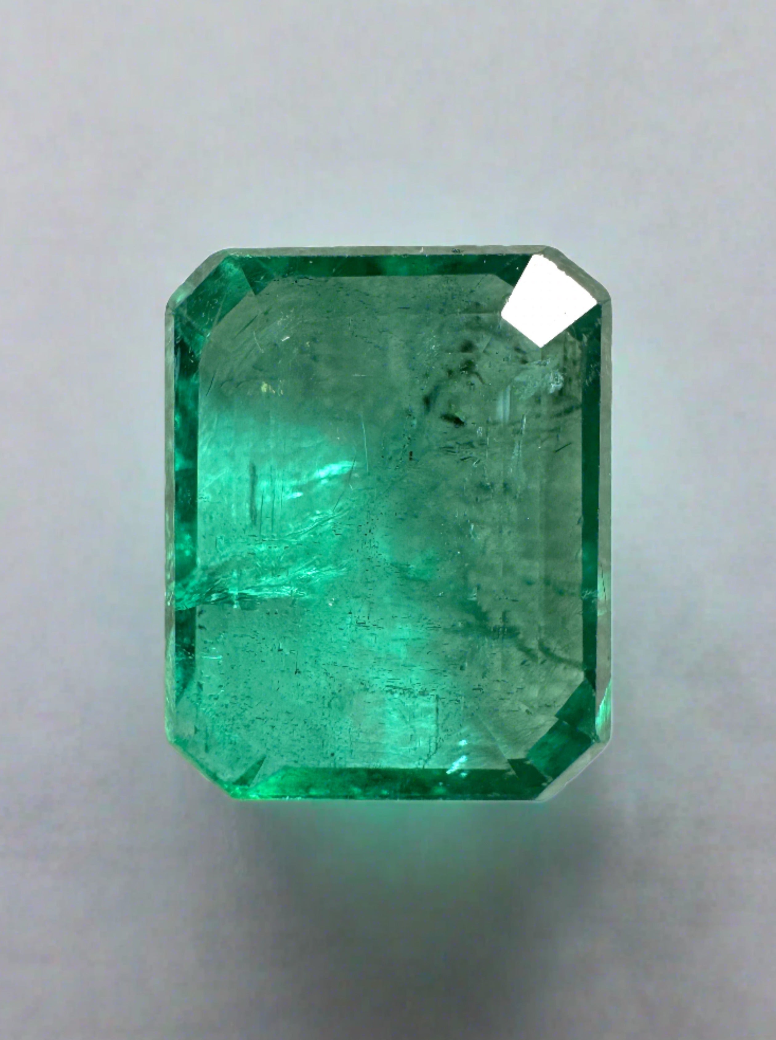 Bluish green 5.16 carat natural Zambian emerald cut loose gemstone by JR Colombian Emeralds.