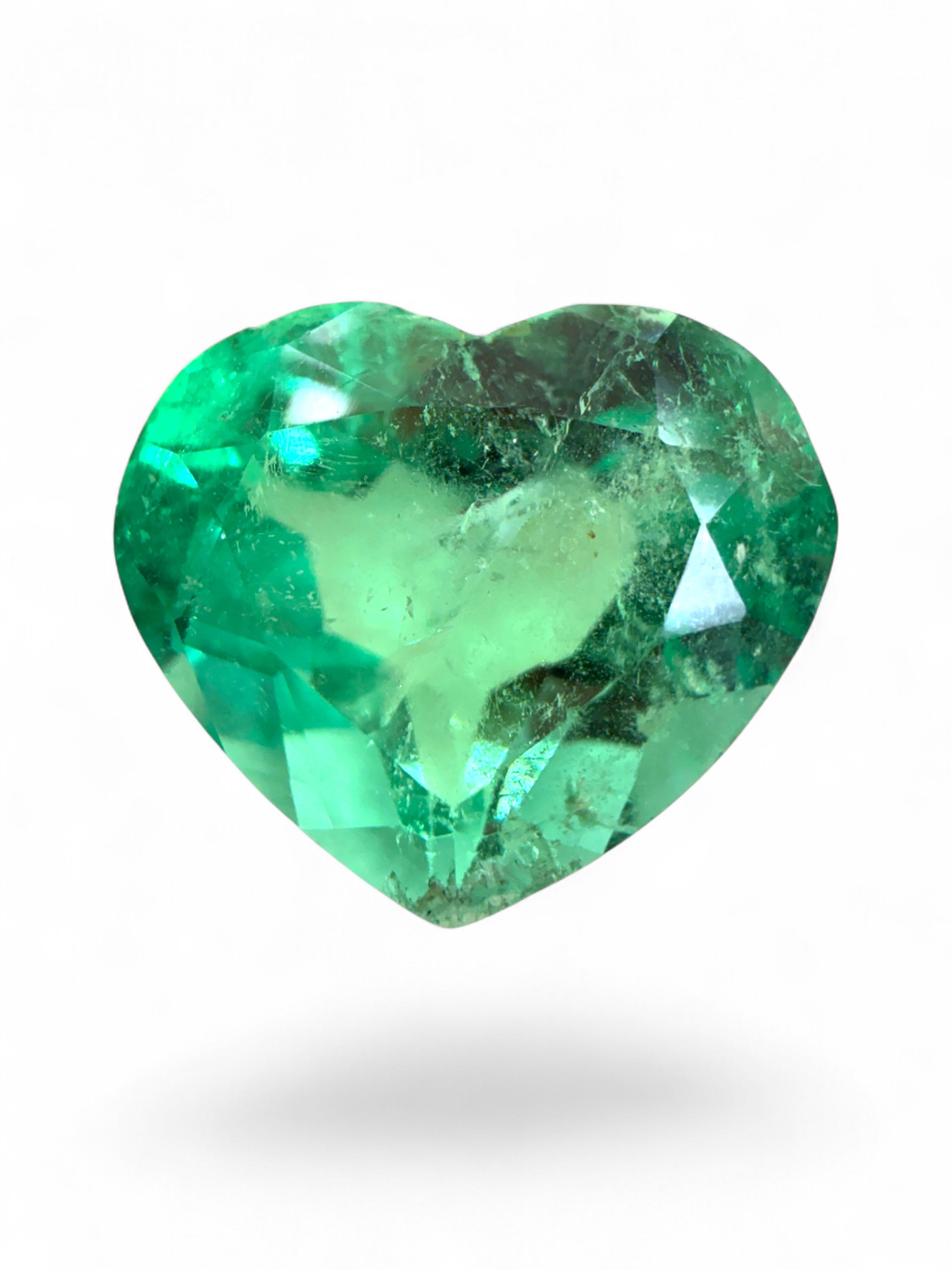 Natural 5.19 carat electric green Colombian emerald loose heart-shaped cut by JR Colombian Emeralds.
