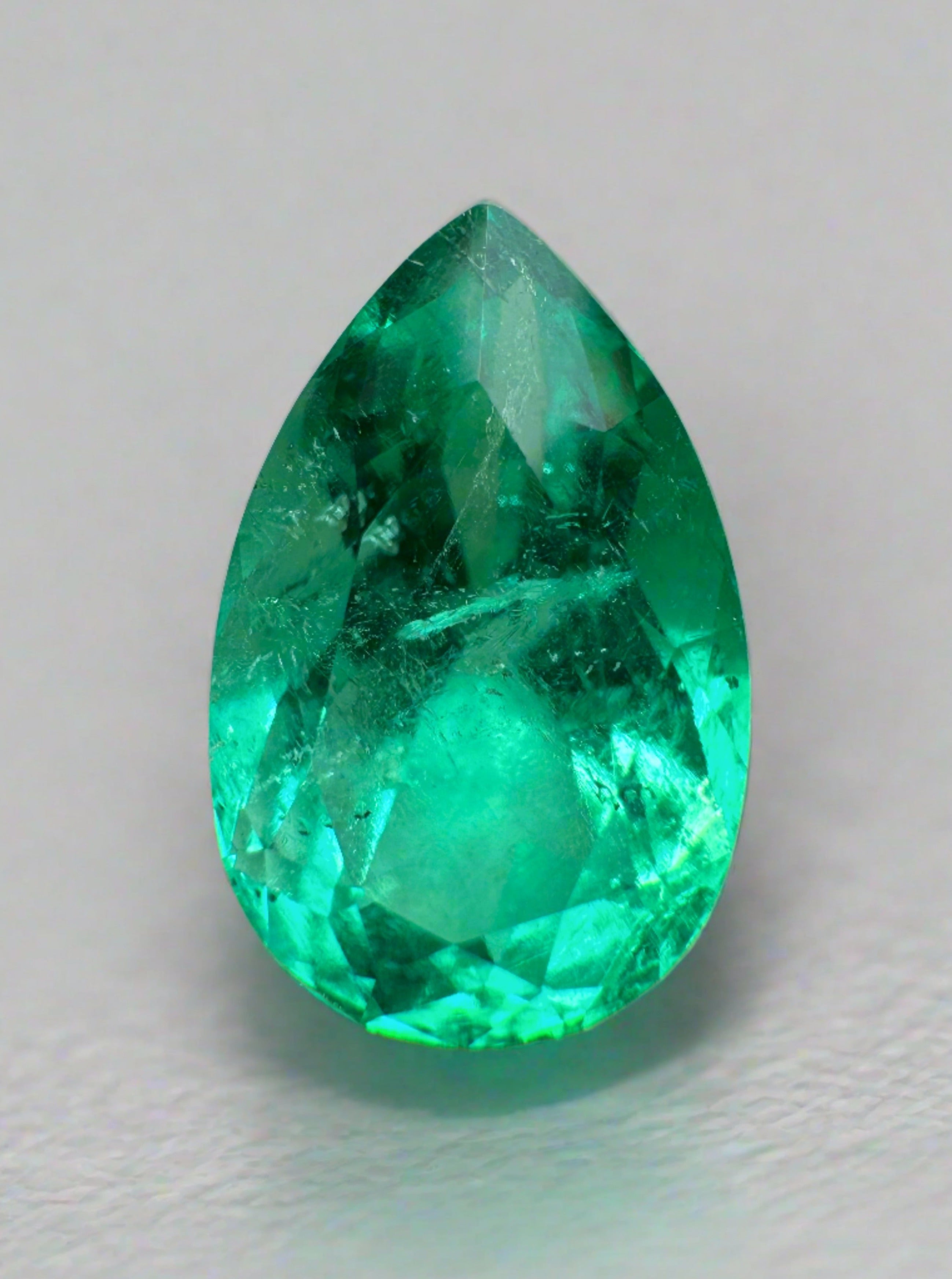 Vivid 5.21 carat Colombian emerald in pear cut with 14.3x9 mm size, natural loose gemstone from JR Colombian Emeralds