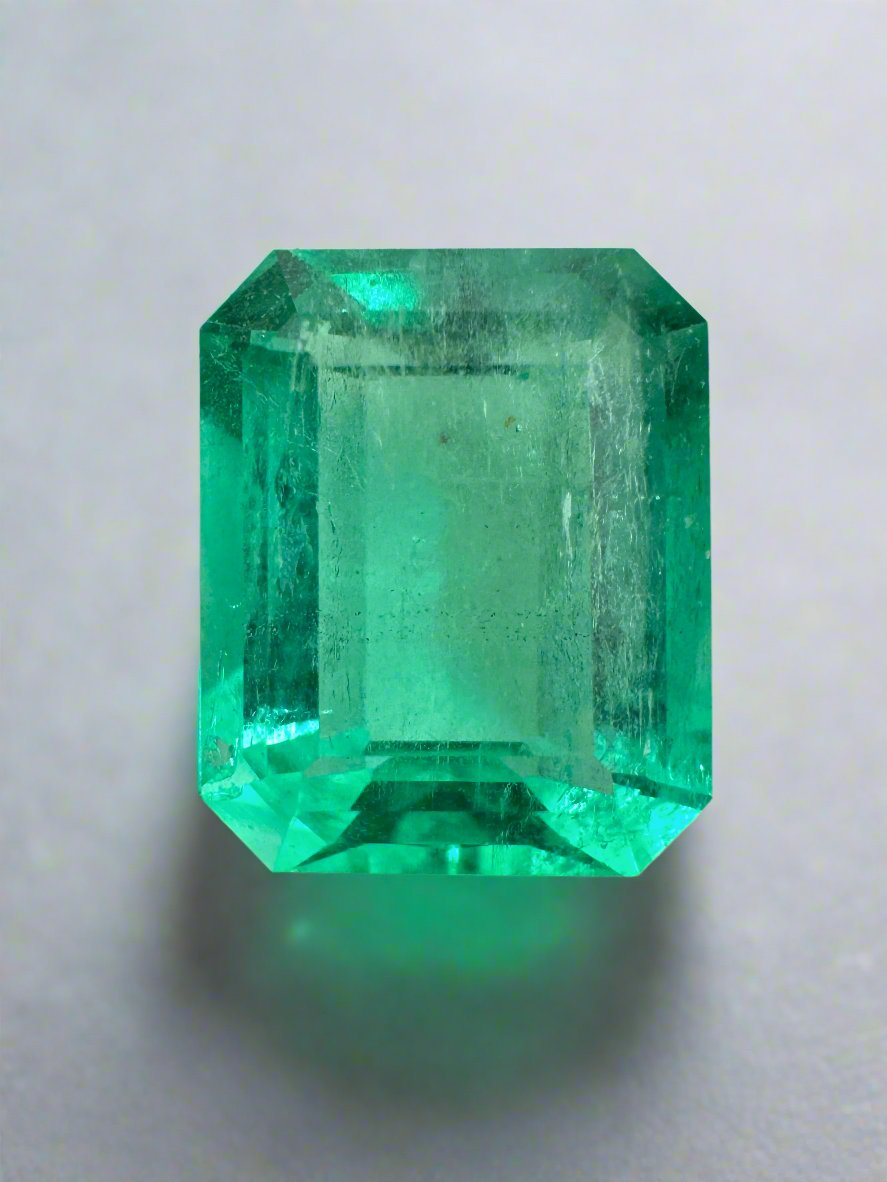 Medium green 5.50 carat Colombian emerald loose gemstone with classic emerald cut from JR Colombian Emeralds.